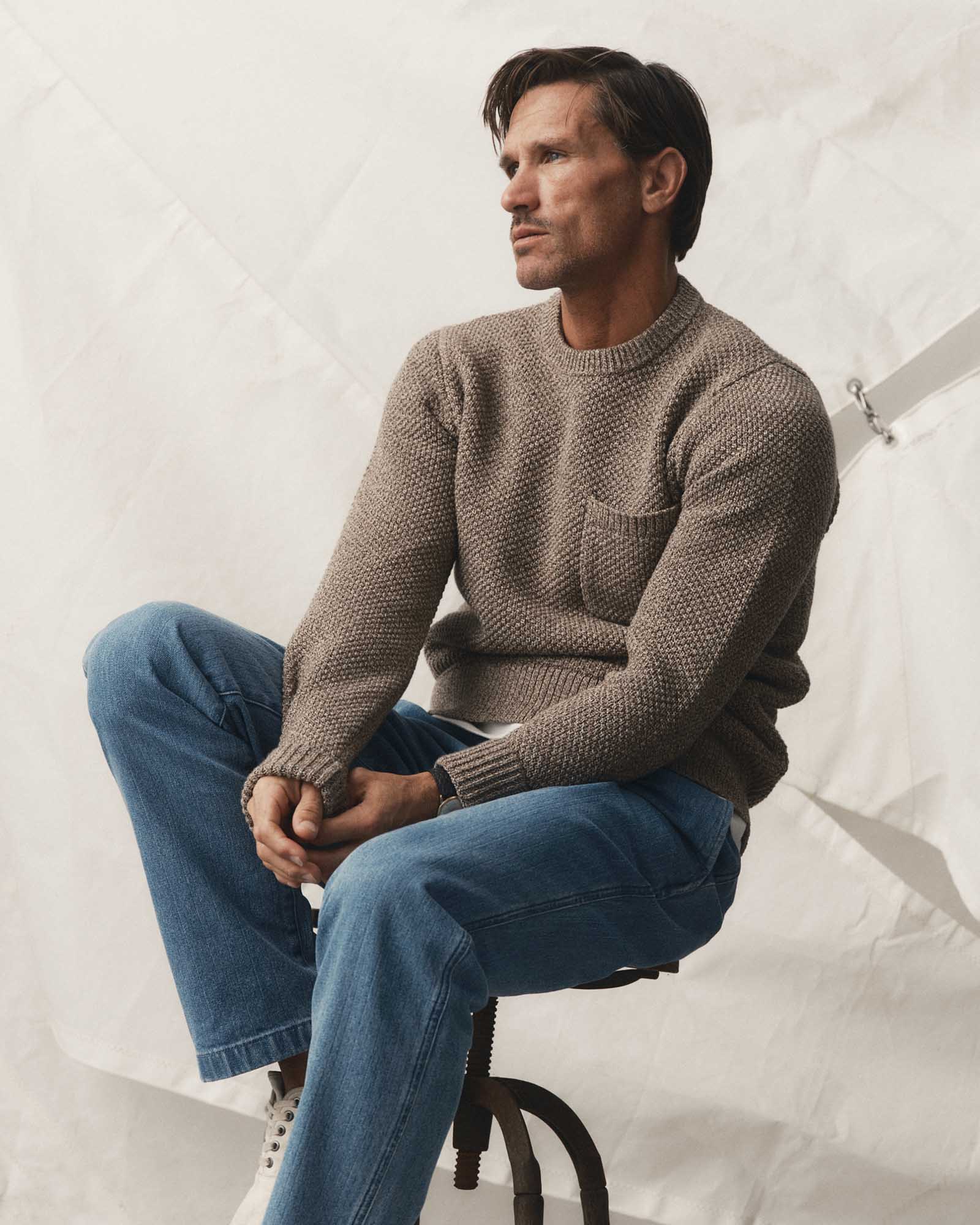 fit model sitting wearing The Crawford Crew Sweater in Coffee Twist, Knits by Taylor Stitch