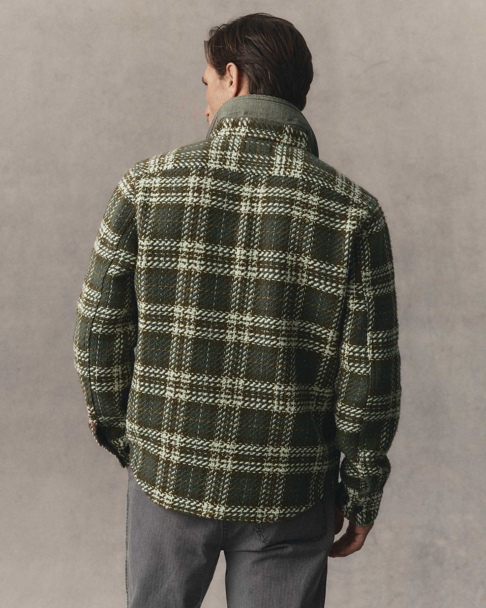 fit model showing off the back of The Cutter Overshirt in Buzzard Check, Wovens by Taylor Stitch