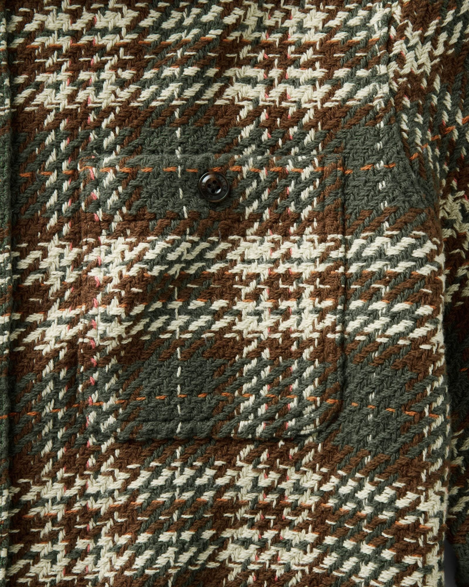 material shot of the pocket on The Cutter Overshirt in Buzzard Check, Wovens by Taylor Stitch