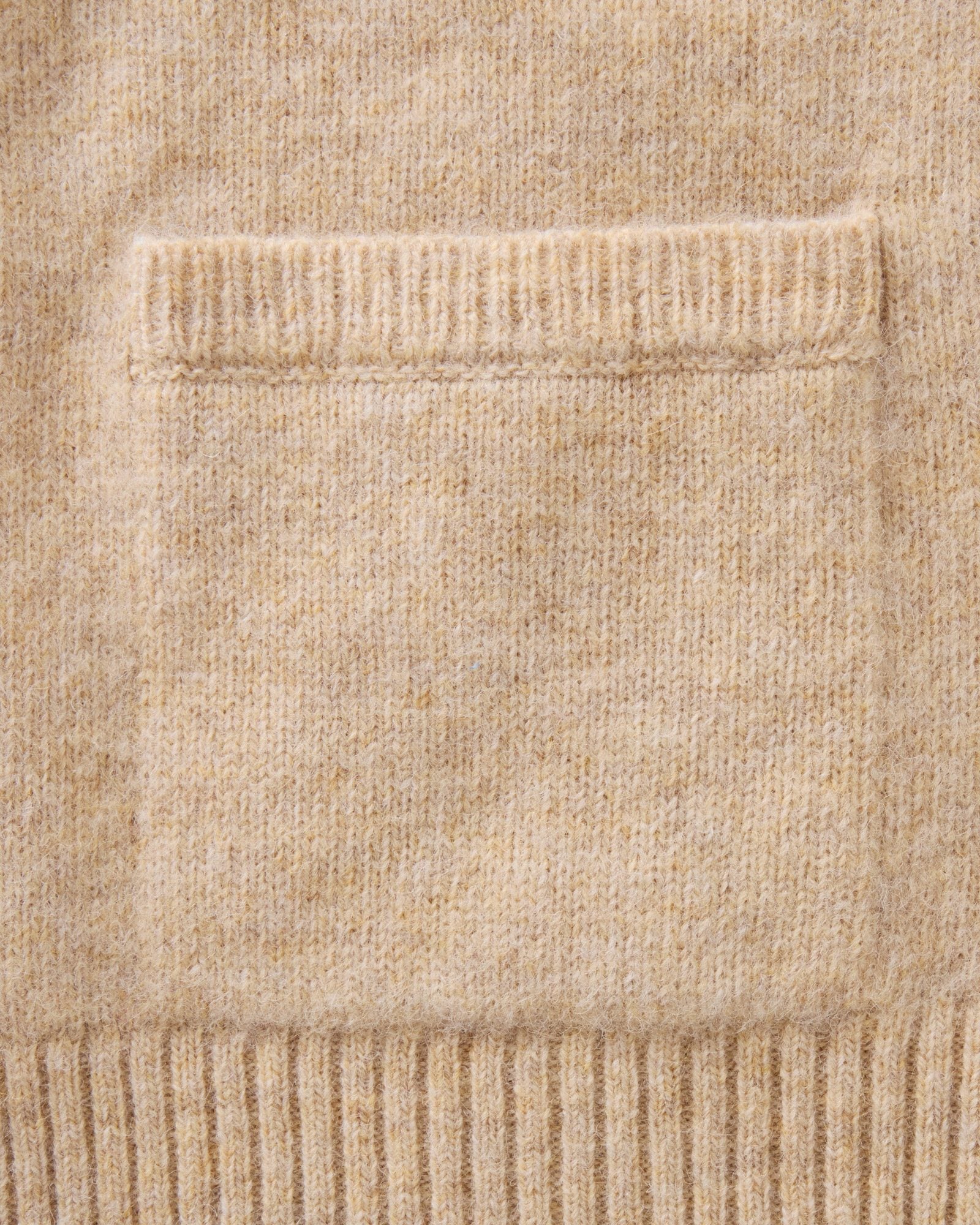 material shot of the pocket on The Eastmoor Cardigan in Oatmeal Wool, Knits by Taylor Stitch