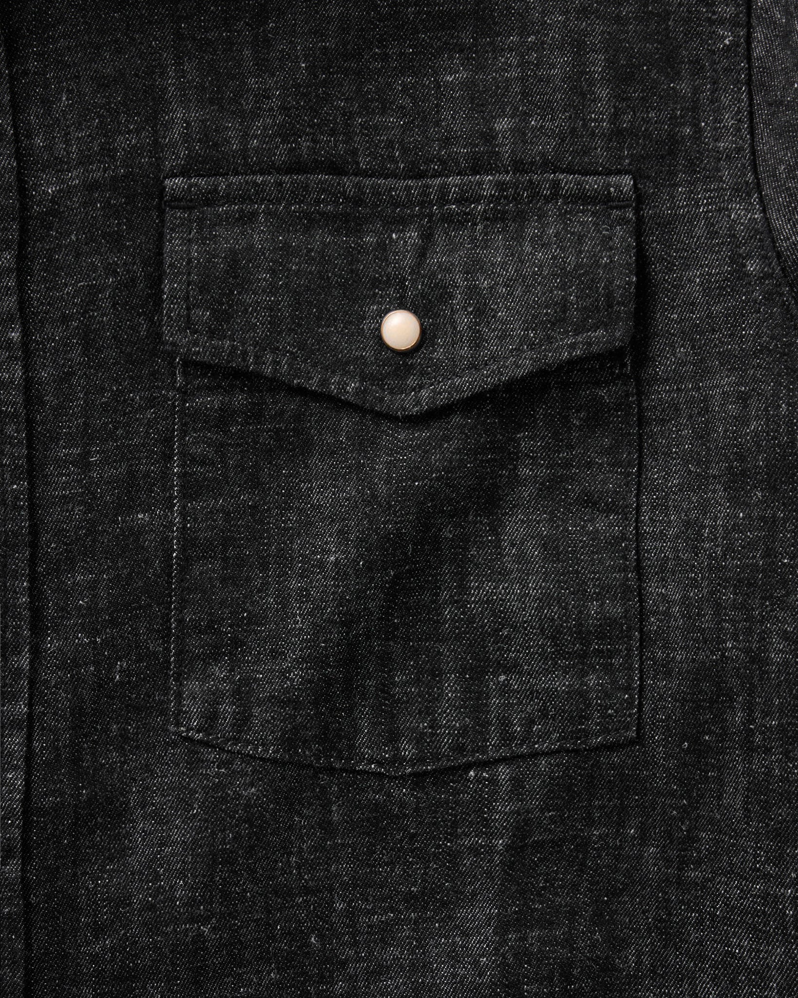 material shot of the sleeve on The Glacier Shirt in Black Indigo Hemp Denim, Wovens by Taylor Stitch