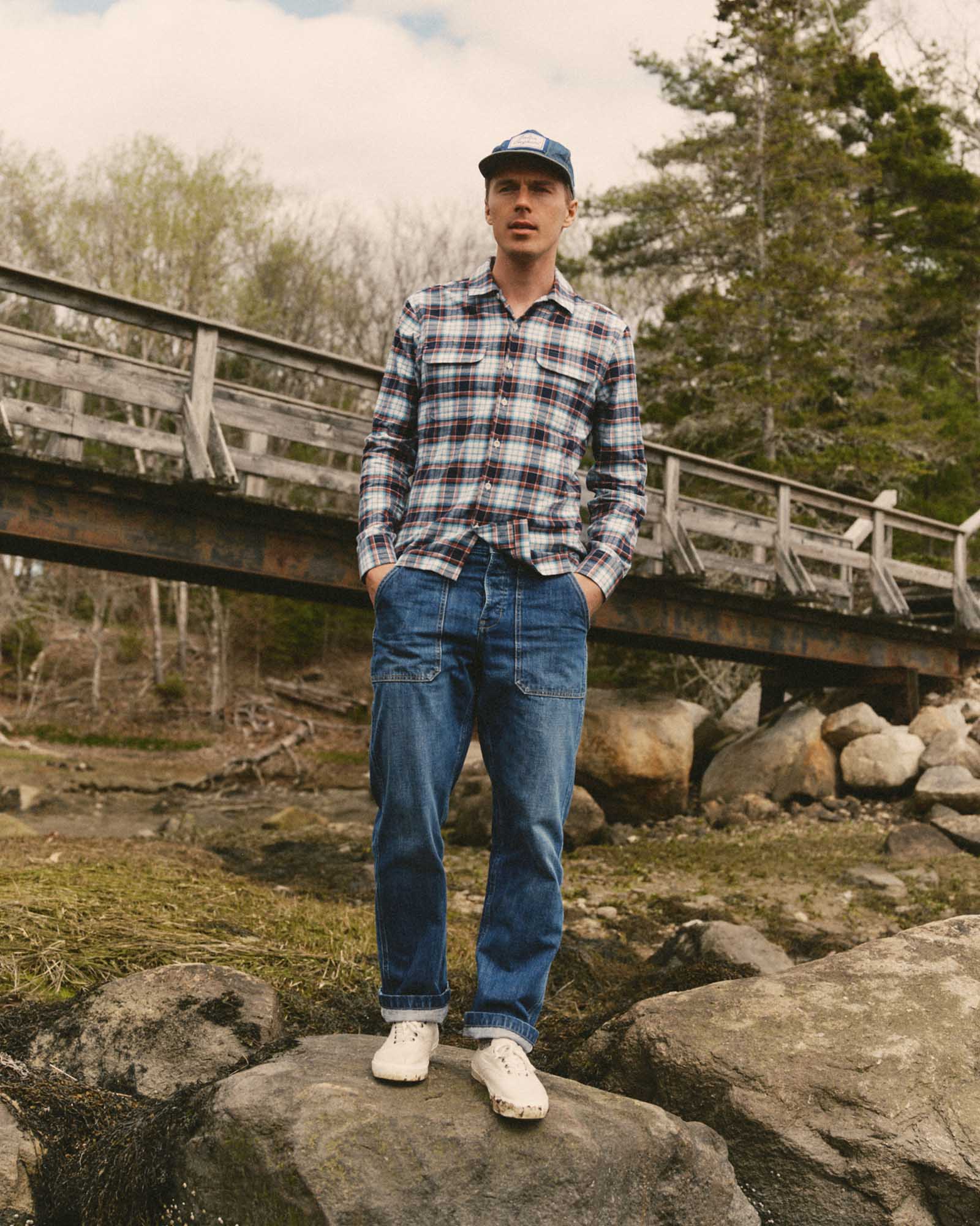 fit model showing off The Mariner Jean in Drift Wash Organic Selvedge, Bottoms by Taylor Stitch