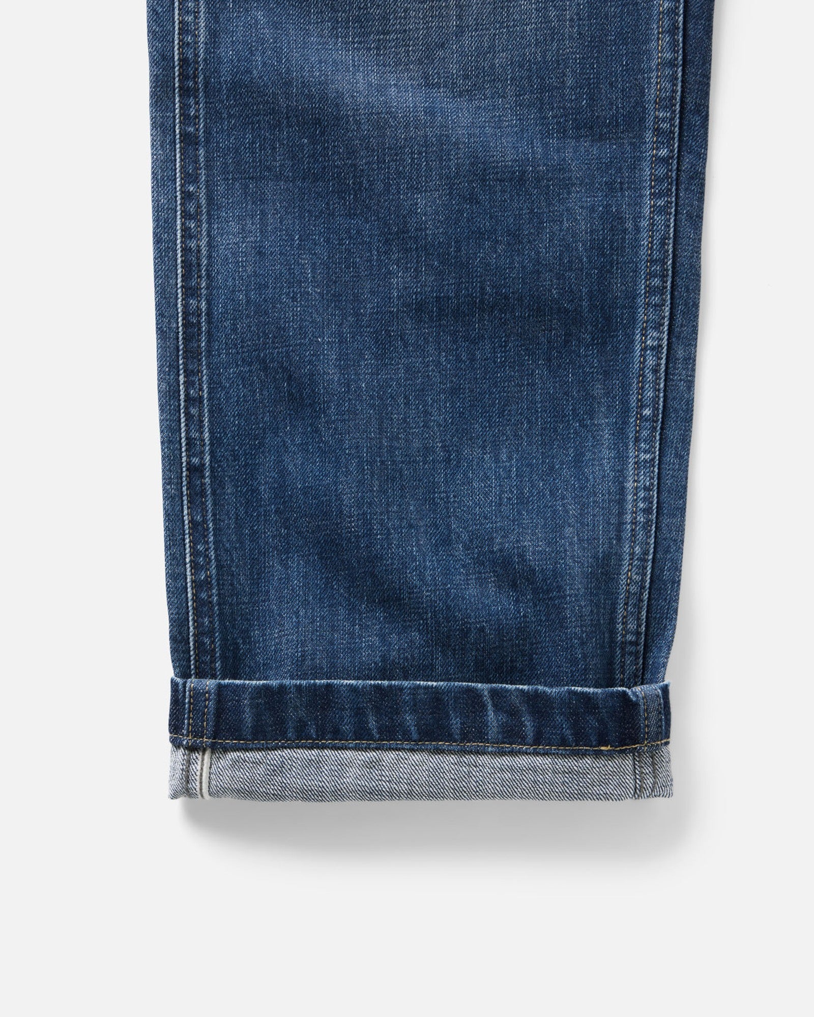 material shot of the cuff on The Mariner Jean in Drift Wash Organic Selvedge, Bottoms by Taylor Stitch