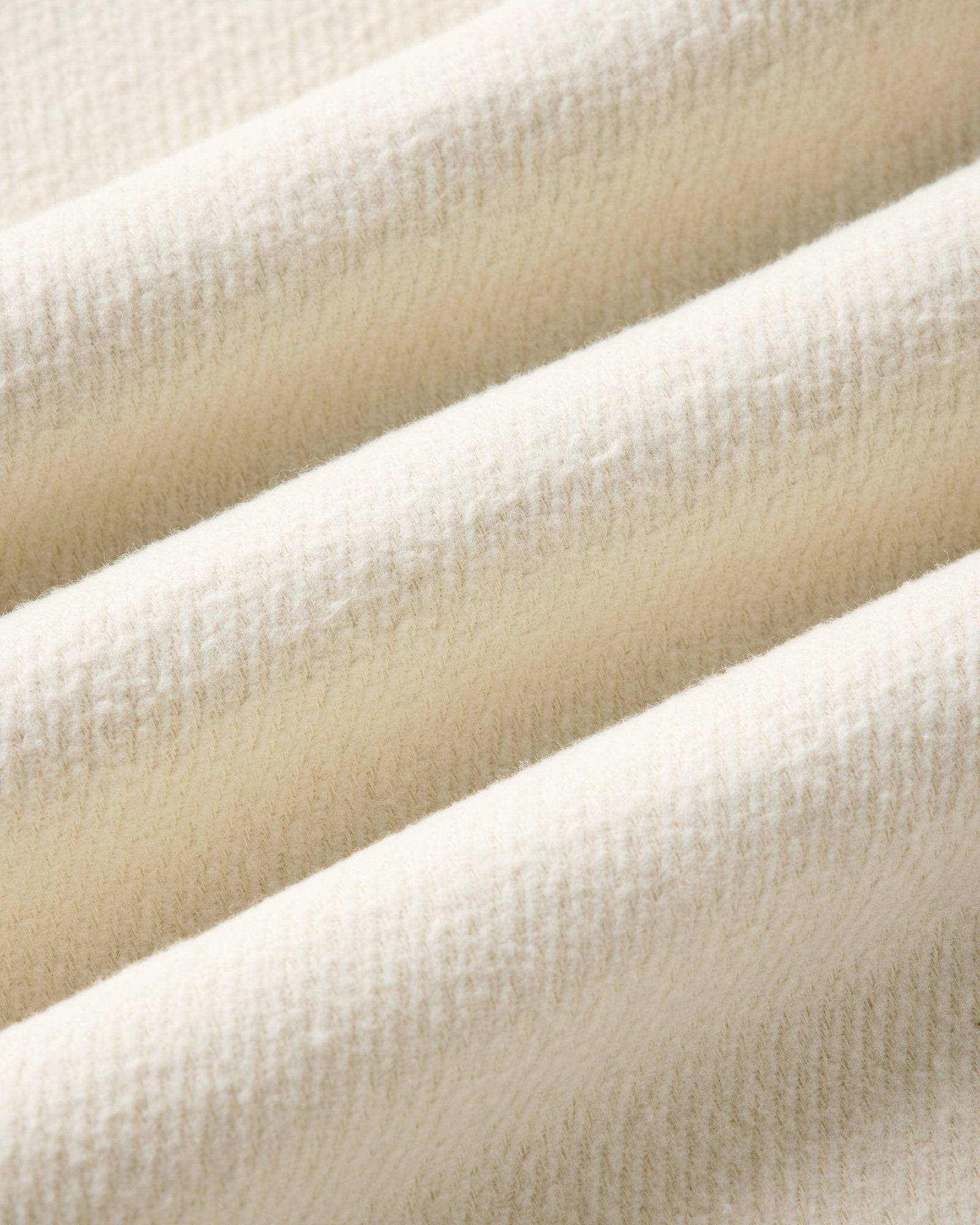 material shot of the fabric on The Maritime Shirt Jacket in Vintage White Moleskin Twill, Outerwear by Taylor Stitch