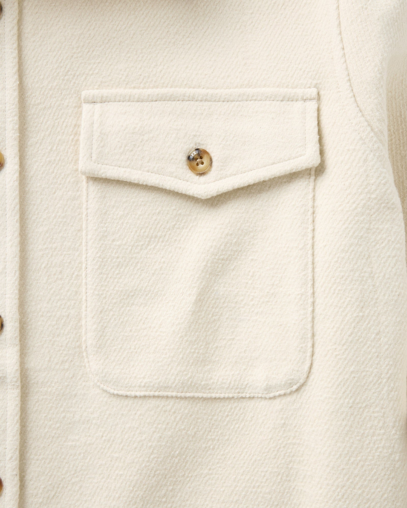 material shot of the pocket on The Maritime Shirt Jacket in Vintage White Moleskin Twill, Outerwear by Taylor Stitch