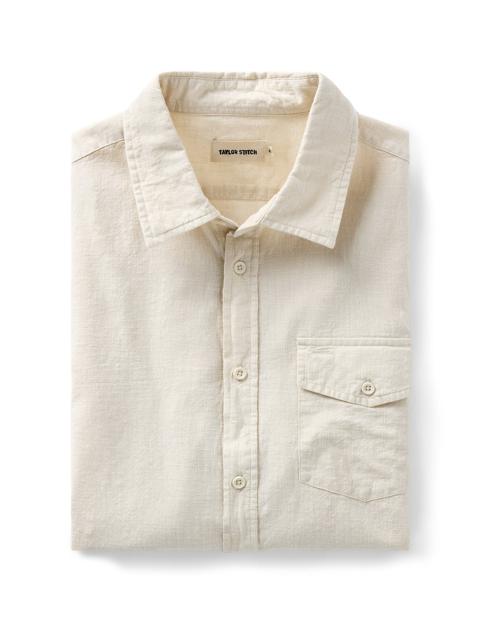 folded flatlay of The Quincy Shirt in Vintage White Slub, Wovens by Taylor Stitch