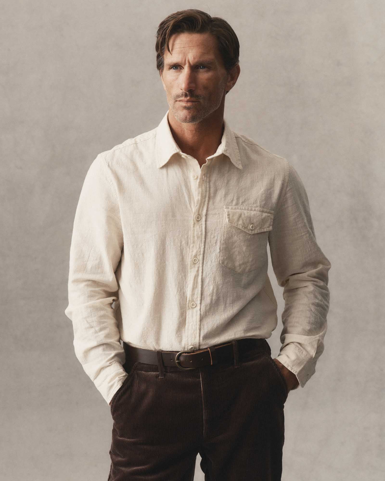 fit model posing in The Quincy Shirt in Vintage White Slub, Wovens by Taylor Stitch