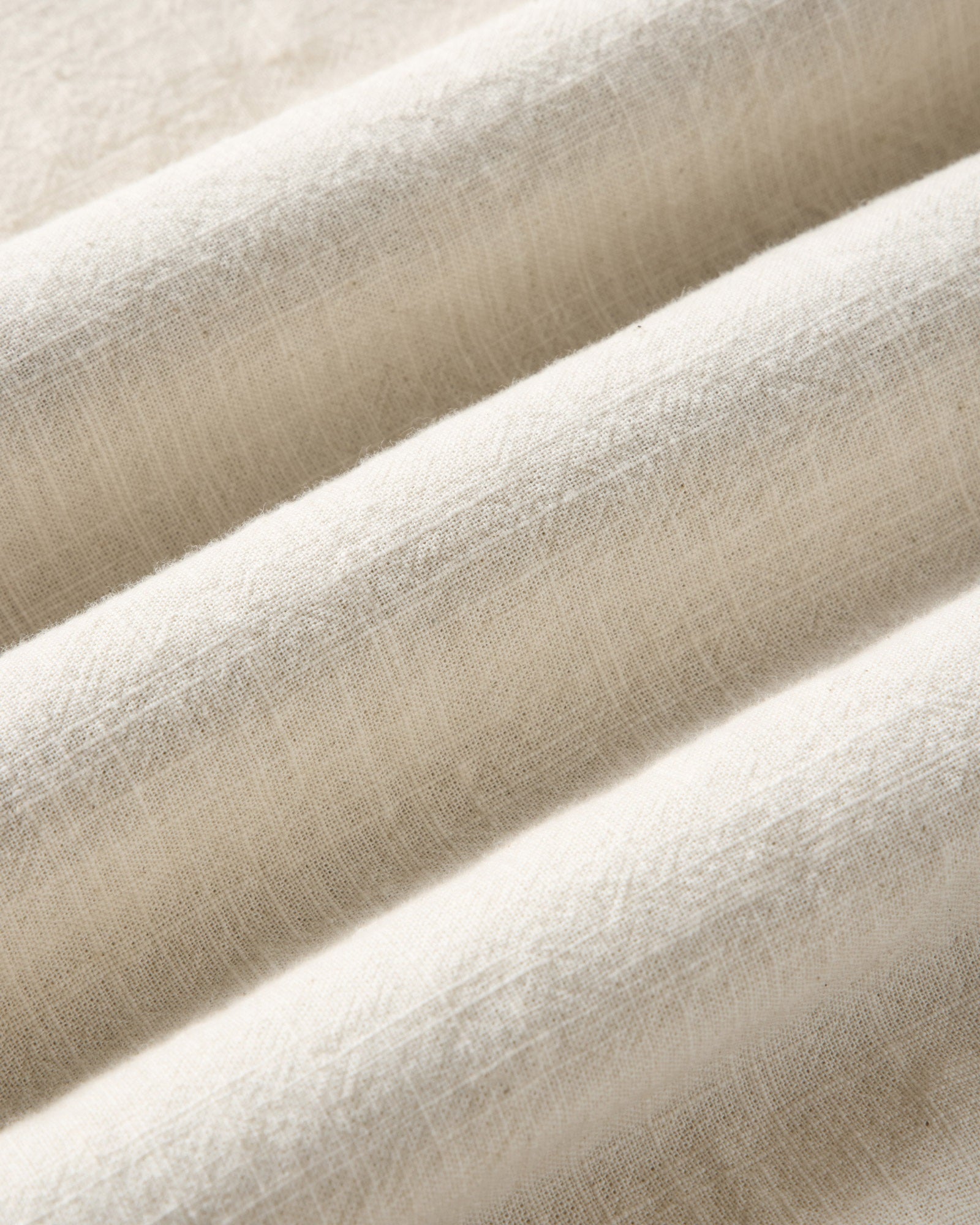 material shot of the fabric on The Quincy Shirt in Vintage White Slub, Wovens by Taylor Stitch