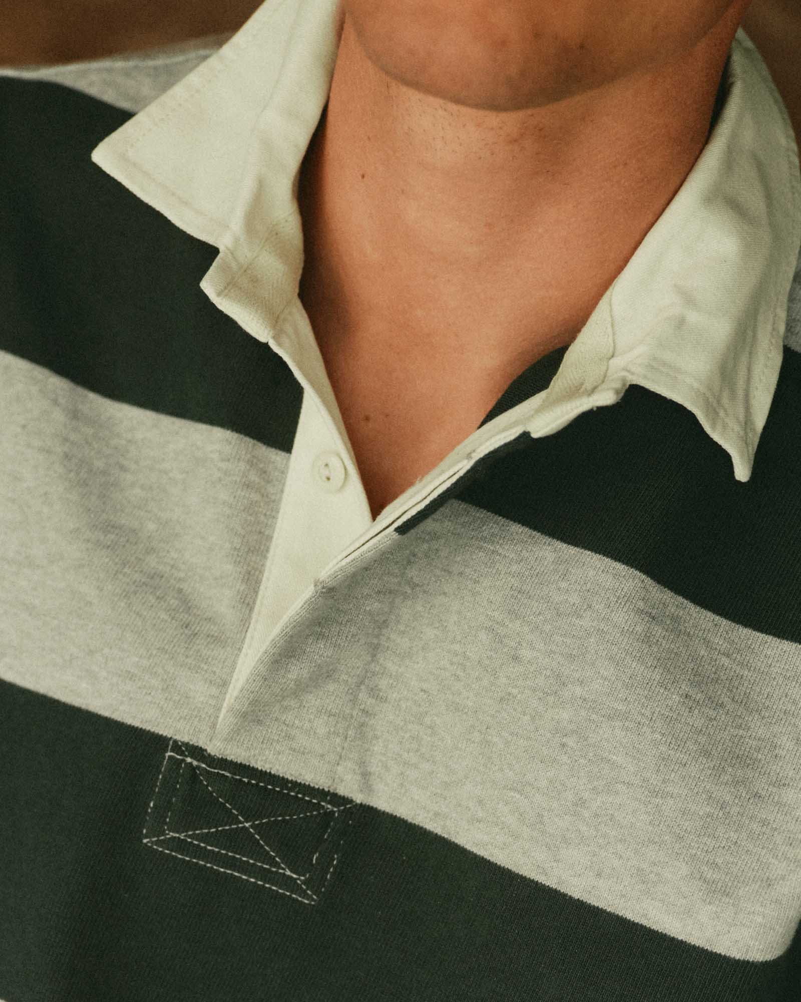 fit model showing off the collar on The Rugby Shirt in Dark Forest Stripe, Knits by Taylor Stitch