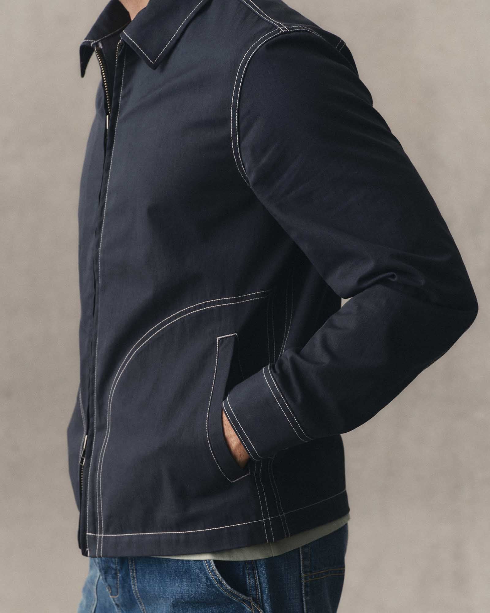 fit model with his hand in the pocket on The Shore Jacket in Navy Twill, Wovens by Taylor Stitch