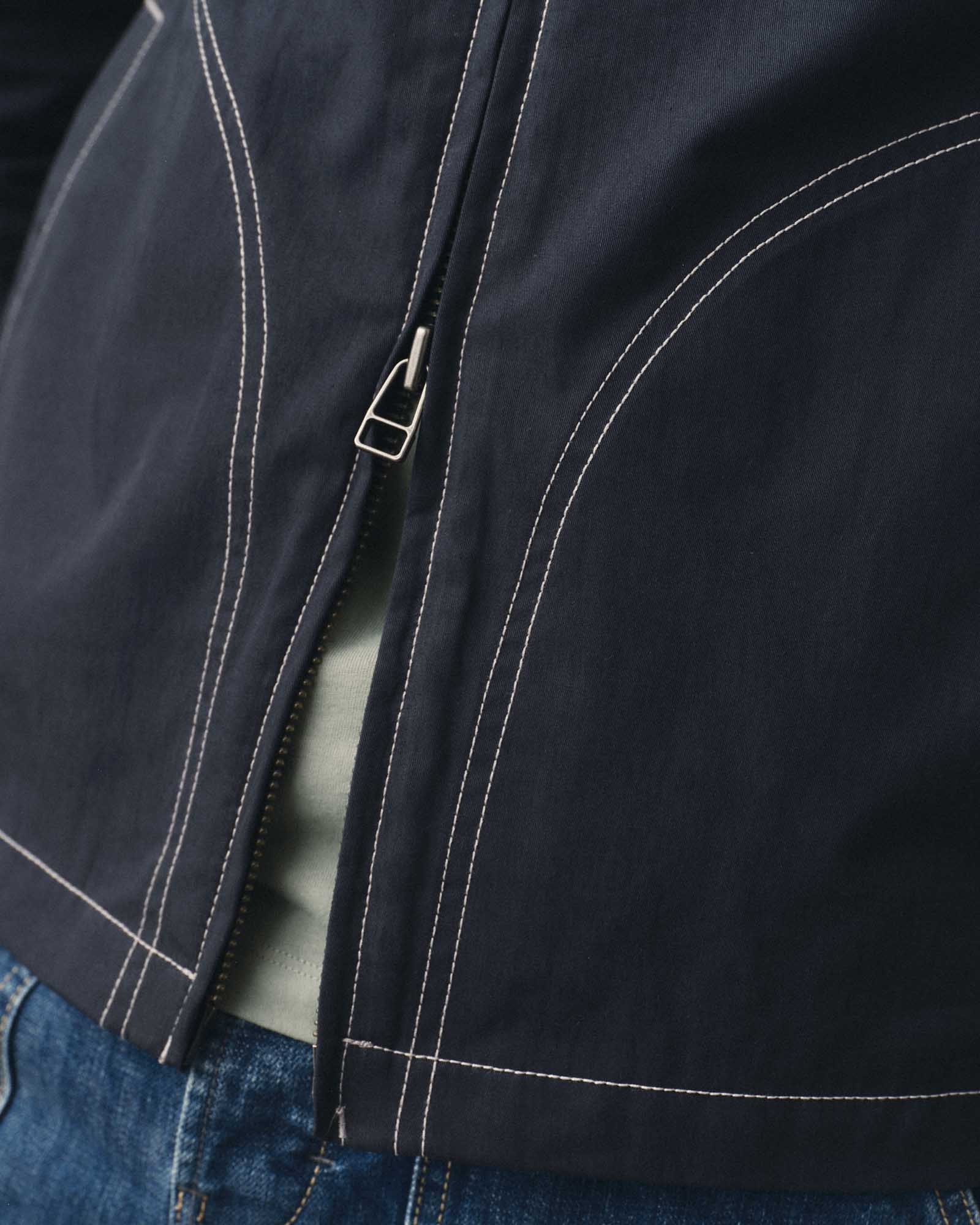 fit model showing off the zipper on The Shore Jacket in Navy Twill, Wovens by Taylor Stitch