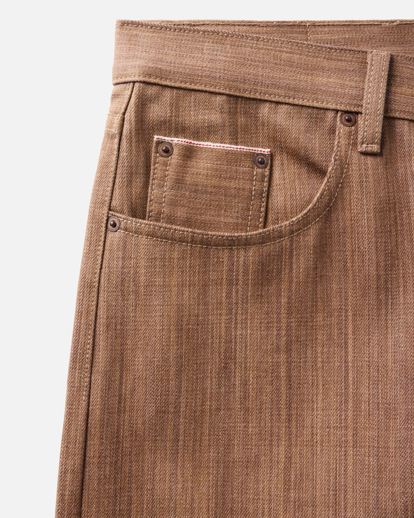 material shot of the pocket on The Straight Jean in Kakishibu Selvedge, Bottoms by Taylor Stitch