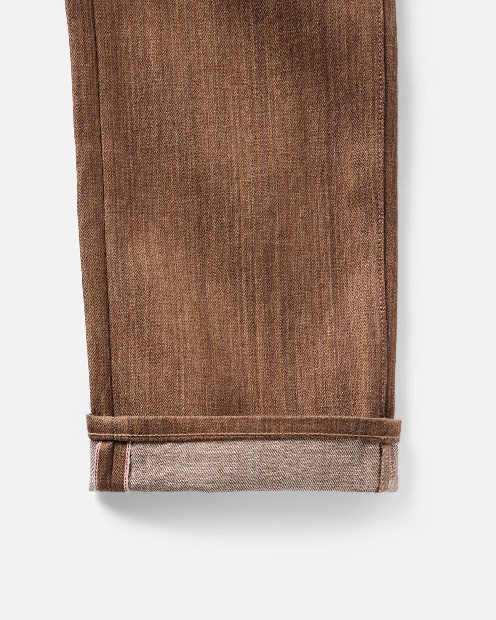 material shot of the cuff on The Straight Jean in Kakishibu Selvedge, Bottoms by Taylor Stitch