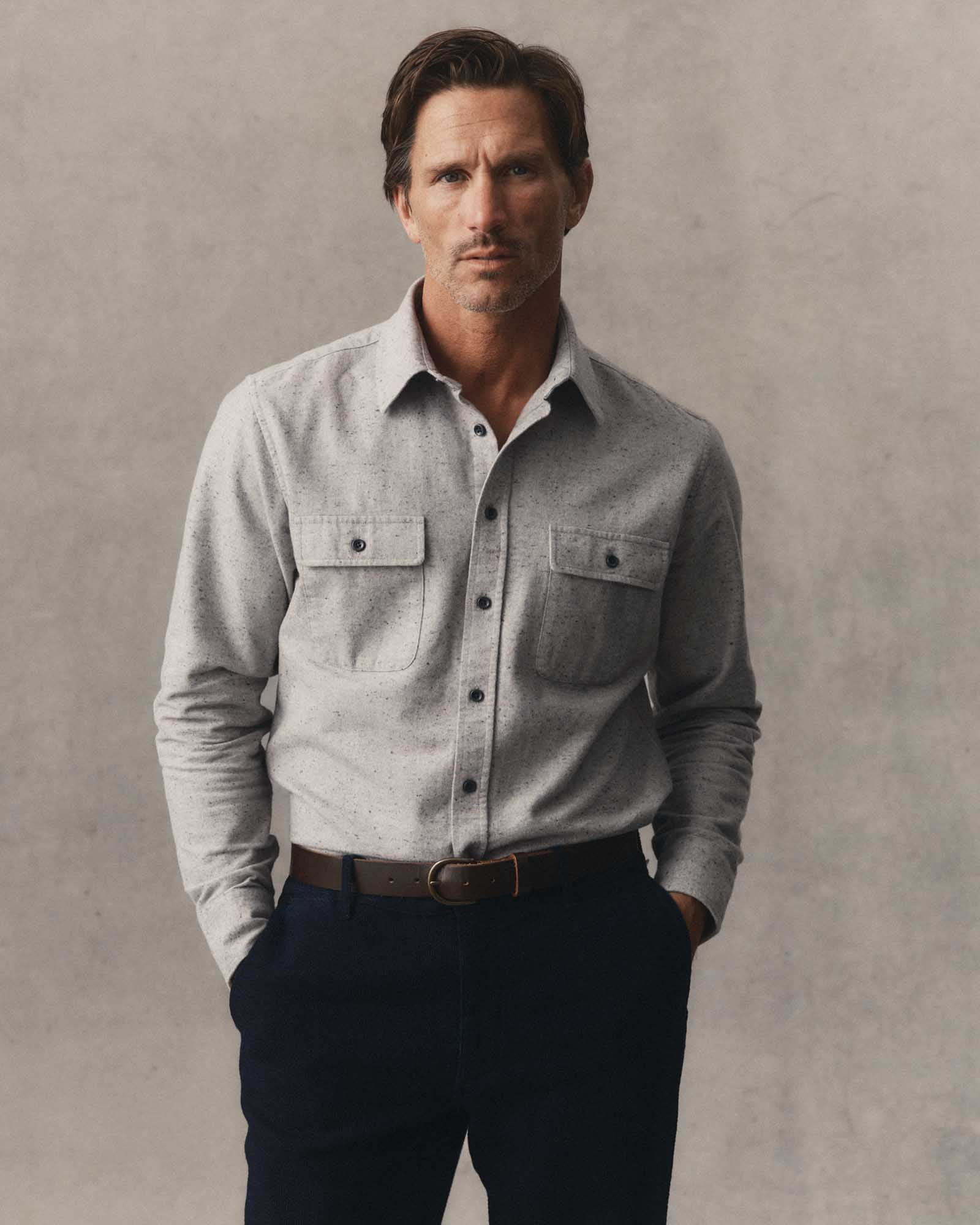 fit model posing in The Yosemite Shirt in Mist Donegal, Wovens by Taylor Stitch