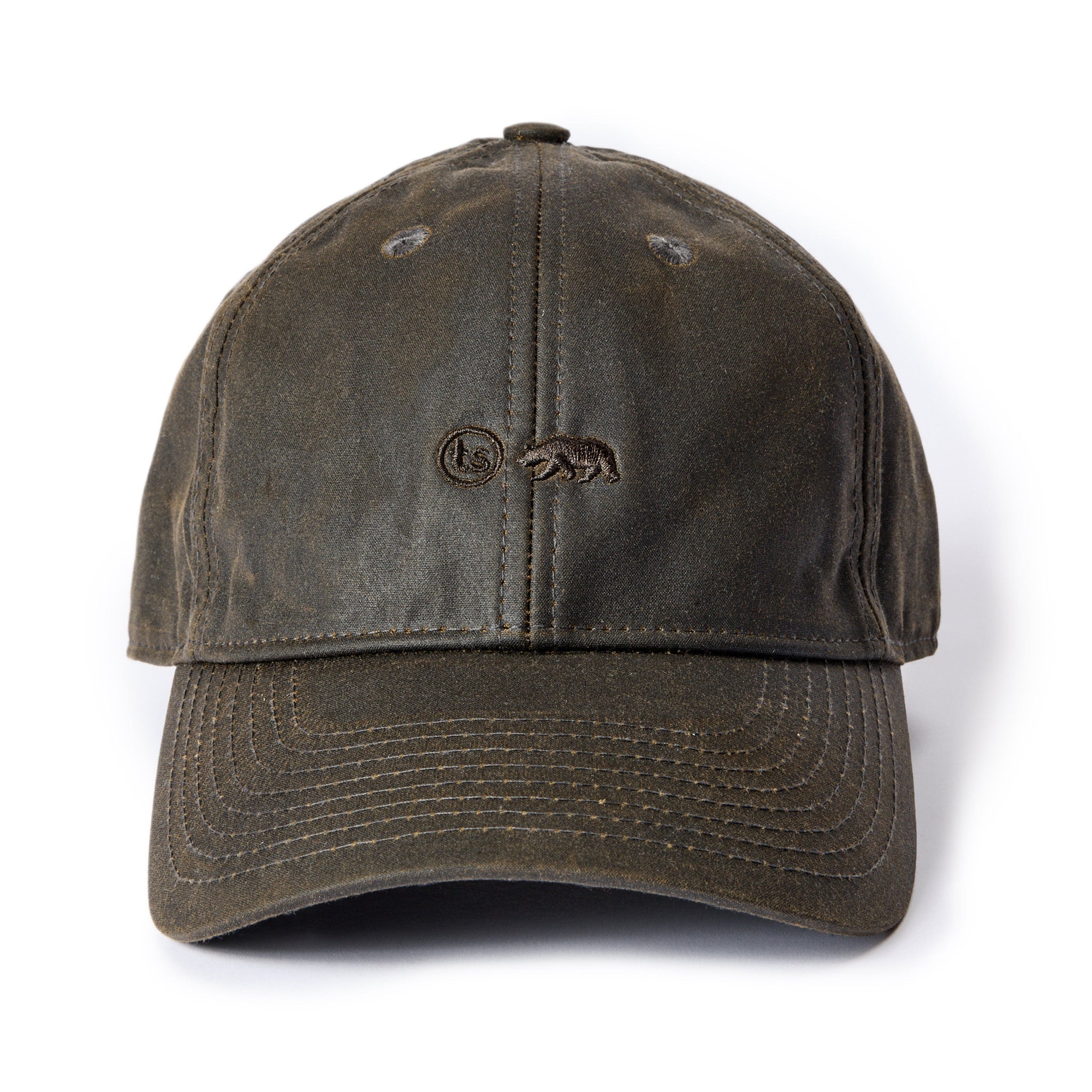 flatlay of The Ball Cap in Soil Waxed Canvas, Accessories by Taylor Stitch