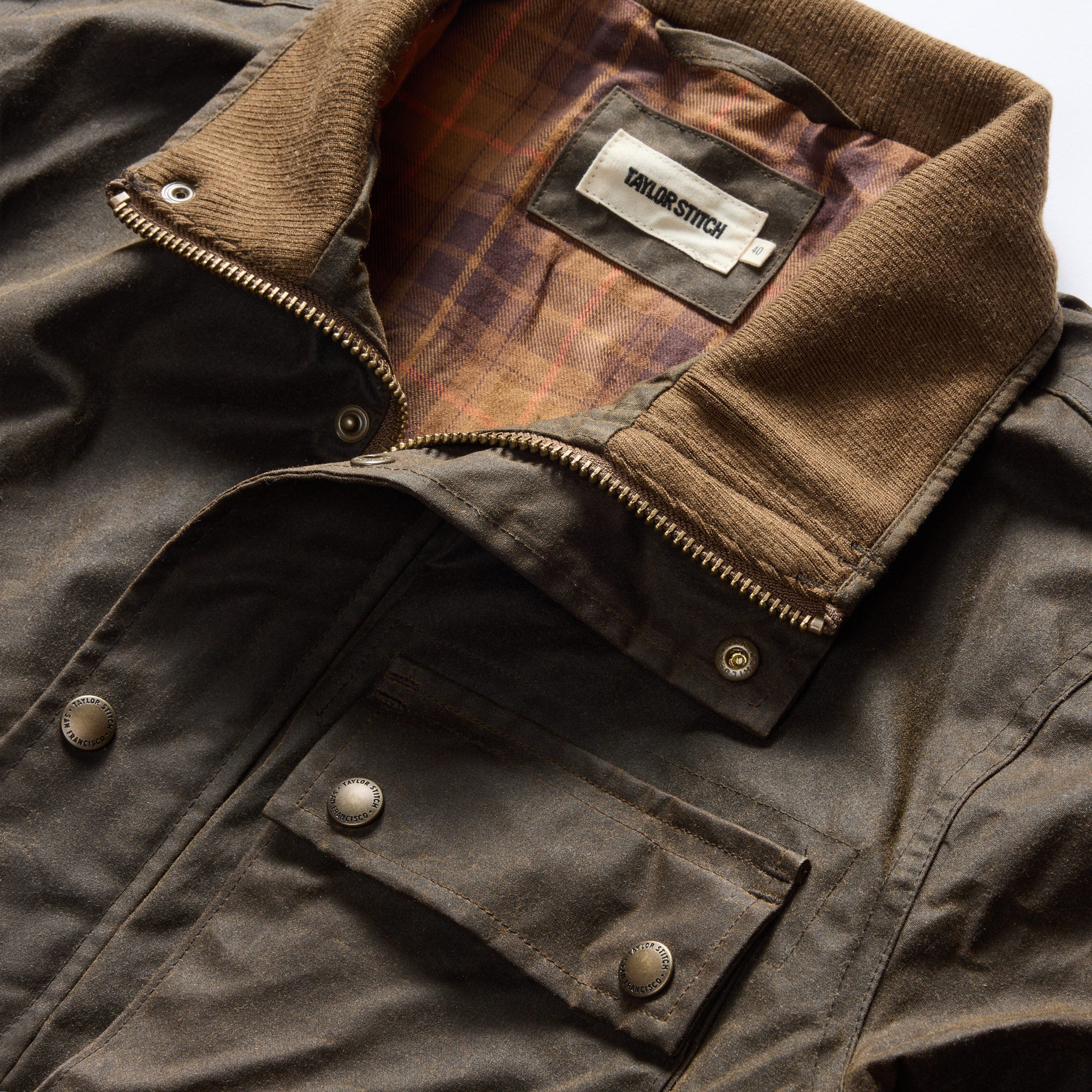 material shot of the collar on The Clutch Jacket in Soil Waxed Canvas, Outerwear by Taylor Stitch