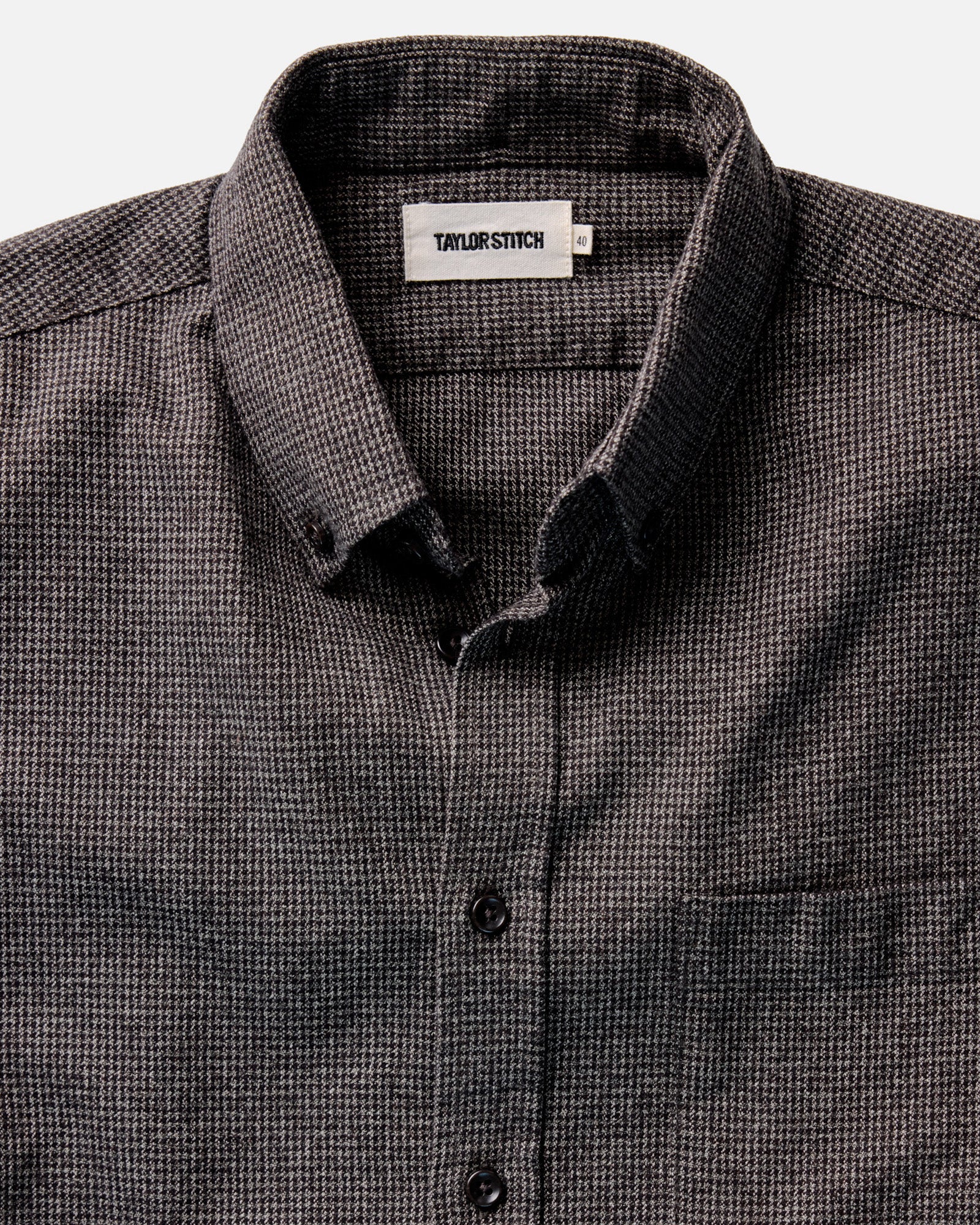 material shot of the horn buttons on The Jack in Dark Forest Houndstooth, Wovens by Taylor Stitch