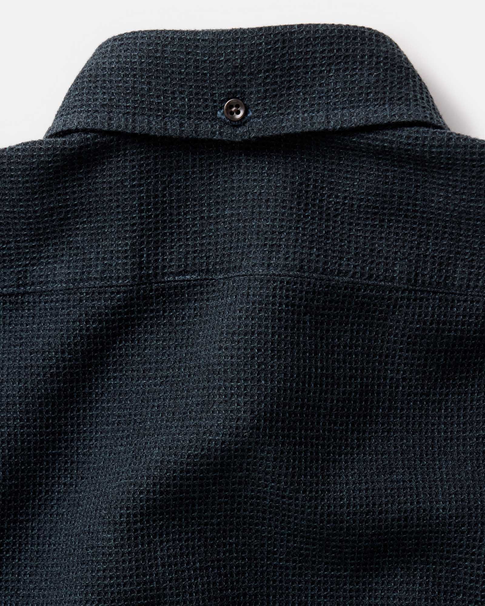 fit model sitting in The Jack in Forest Waffle, Wovens by Taylor Stitch
