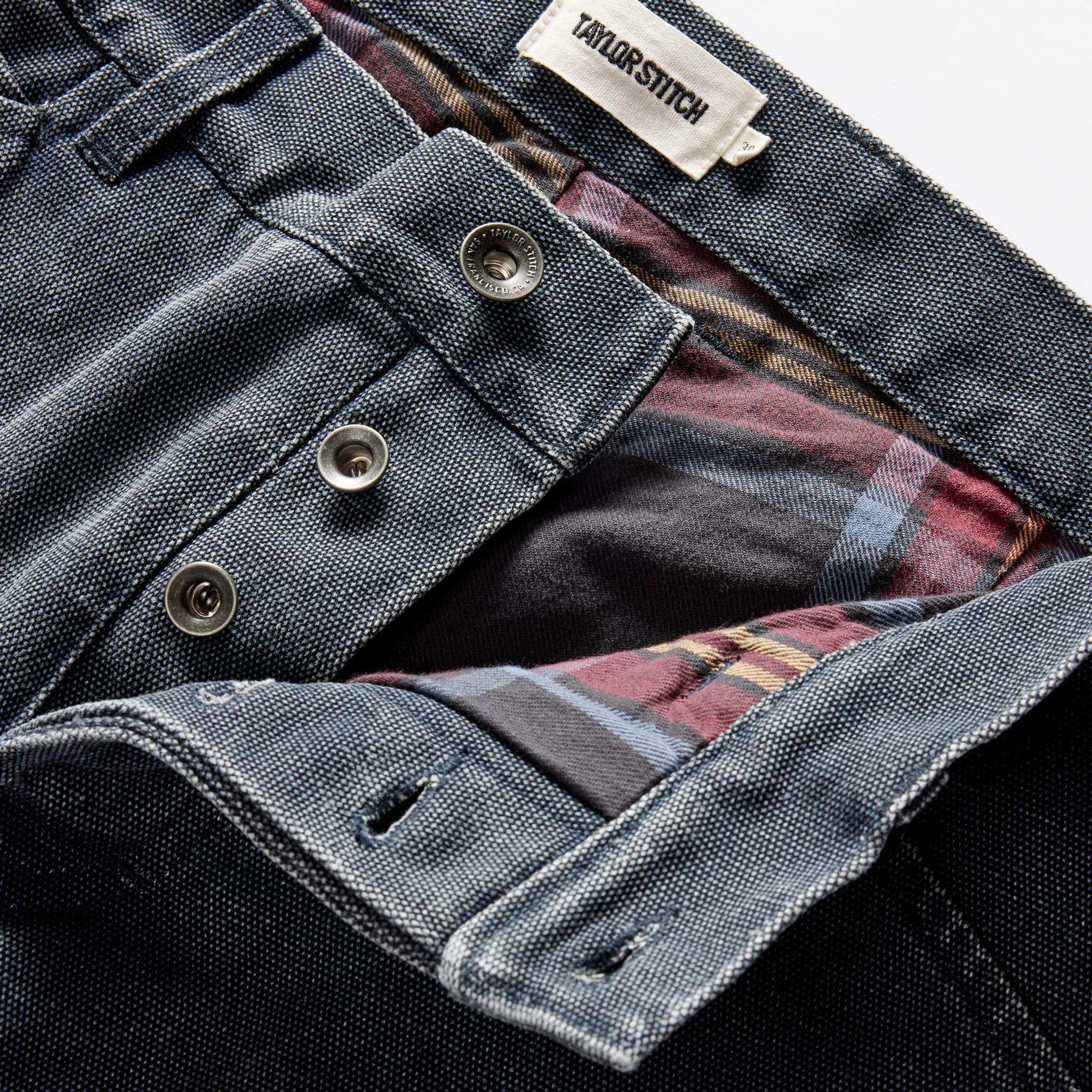 material shot of the button fly on The Lined Chore Pant in Navy Chipped Canvas, Bottoms by Taylor Stitch