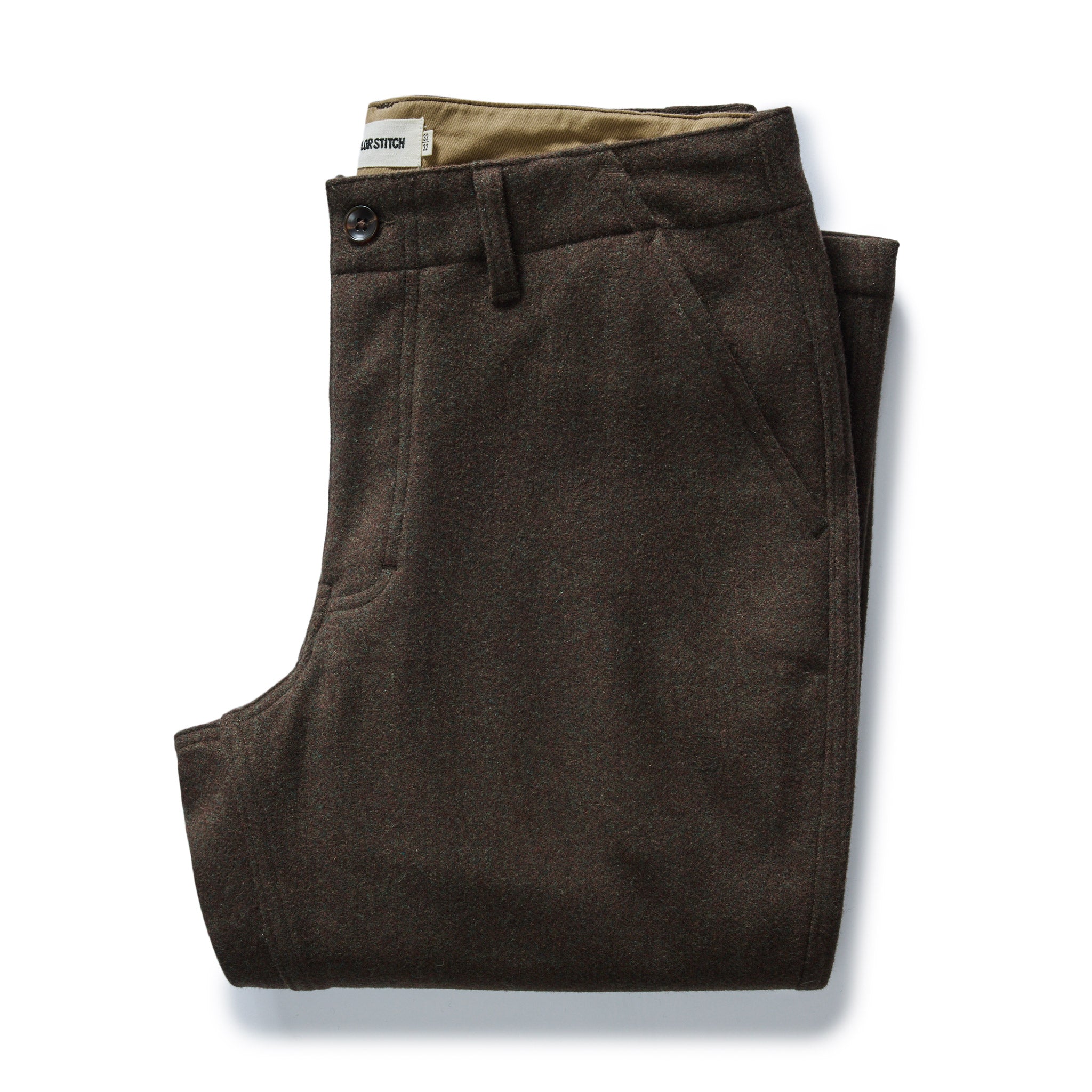 folded flatlay of The Carnegie Pant in Army Herringbone Wool, Bottoms by Taylor Stitch