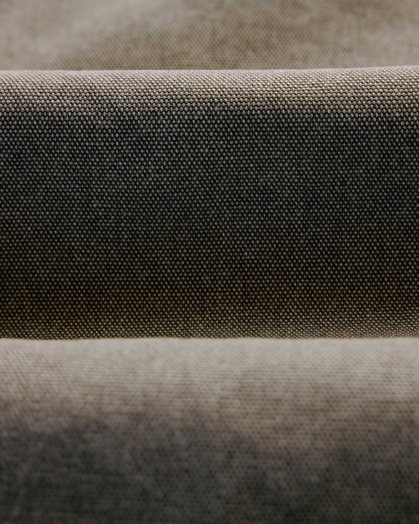 material shot of the buttons on The Shop Shirt in Stone Chipped Canvas, Wovens by Taylor Stitch