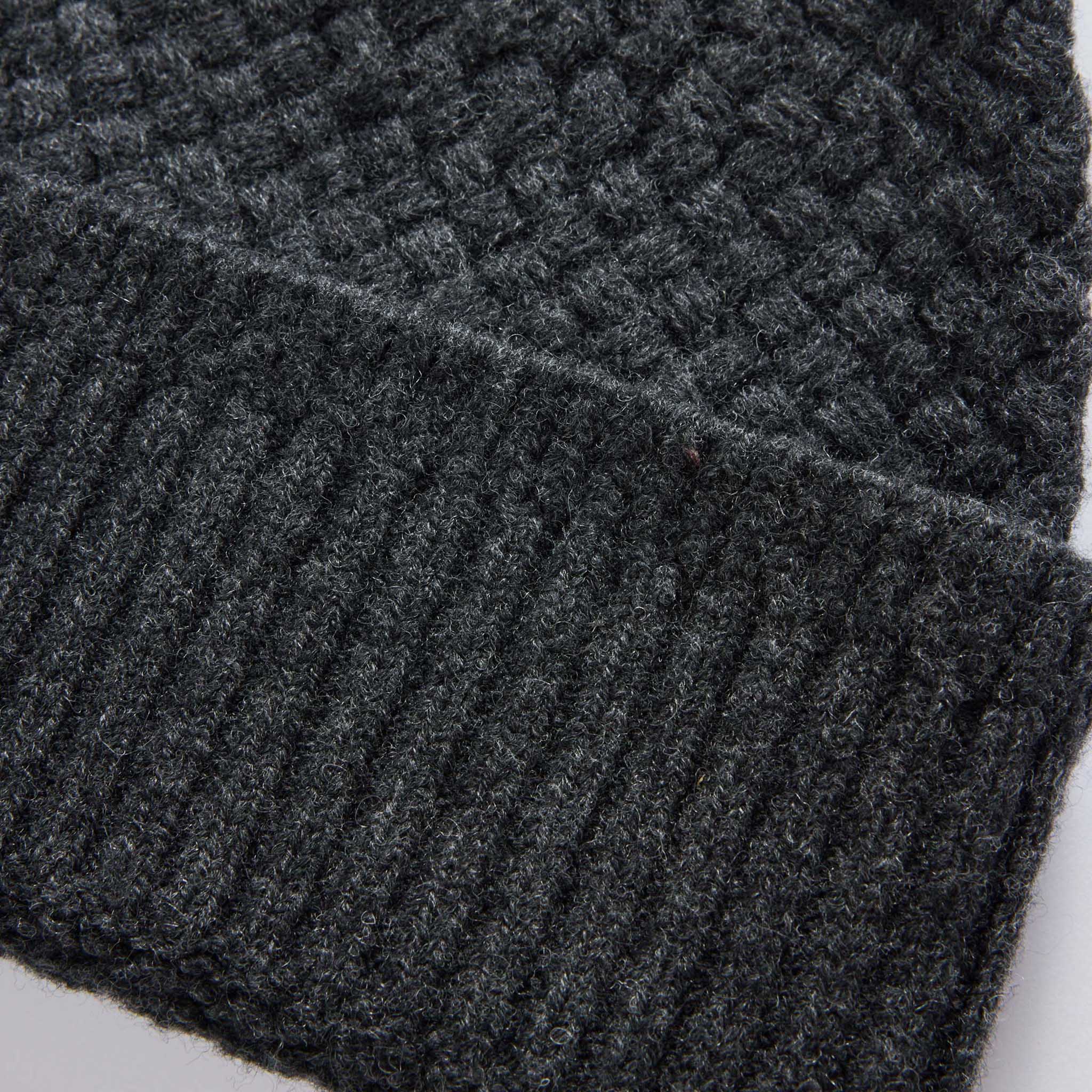 material shot of the cuff on The Textured Knit Beanie in Heather Coal Merino, Accessories by Taylor Stitch