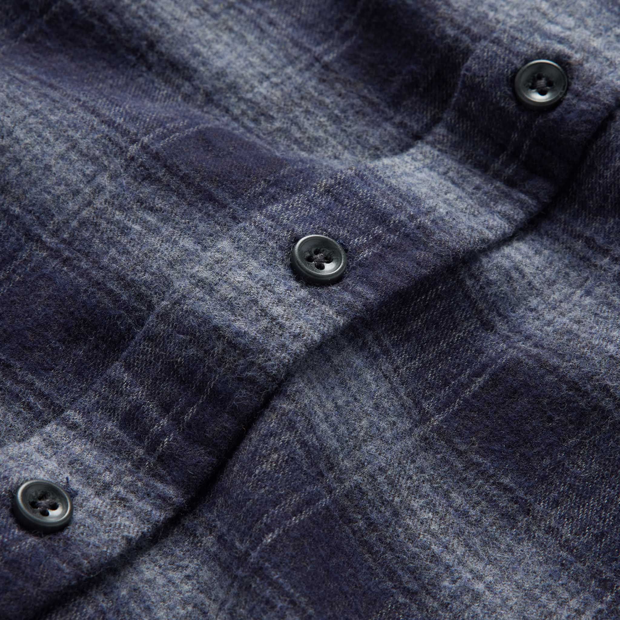 material shot of the buttons on The Yosemite Shirt in Navy Shadow Plaid, Wovens by Taylor Stitch