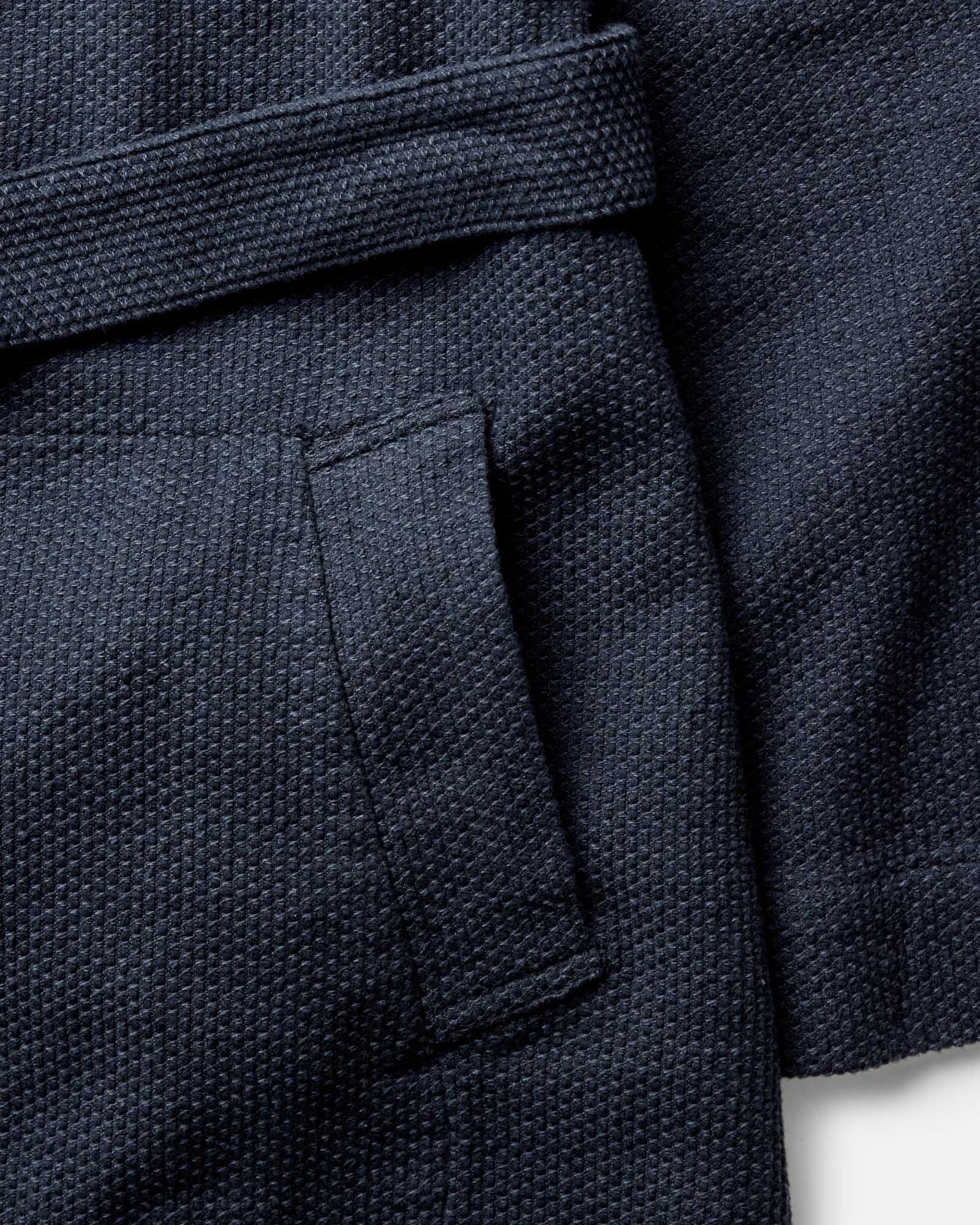 material shot of the pocket on The Apres Robe in Navy Sashiko, Accessories by Taylor Stitch