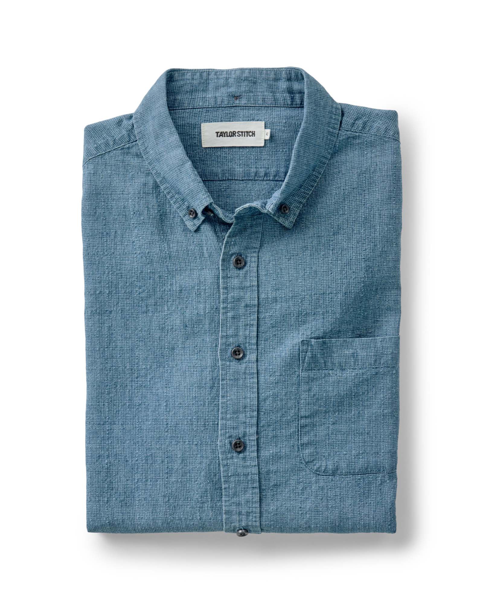 folded flatlay of The Jack in Indigo Check Linen, Wovens by Taylor Stitch