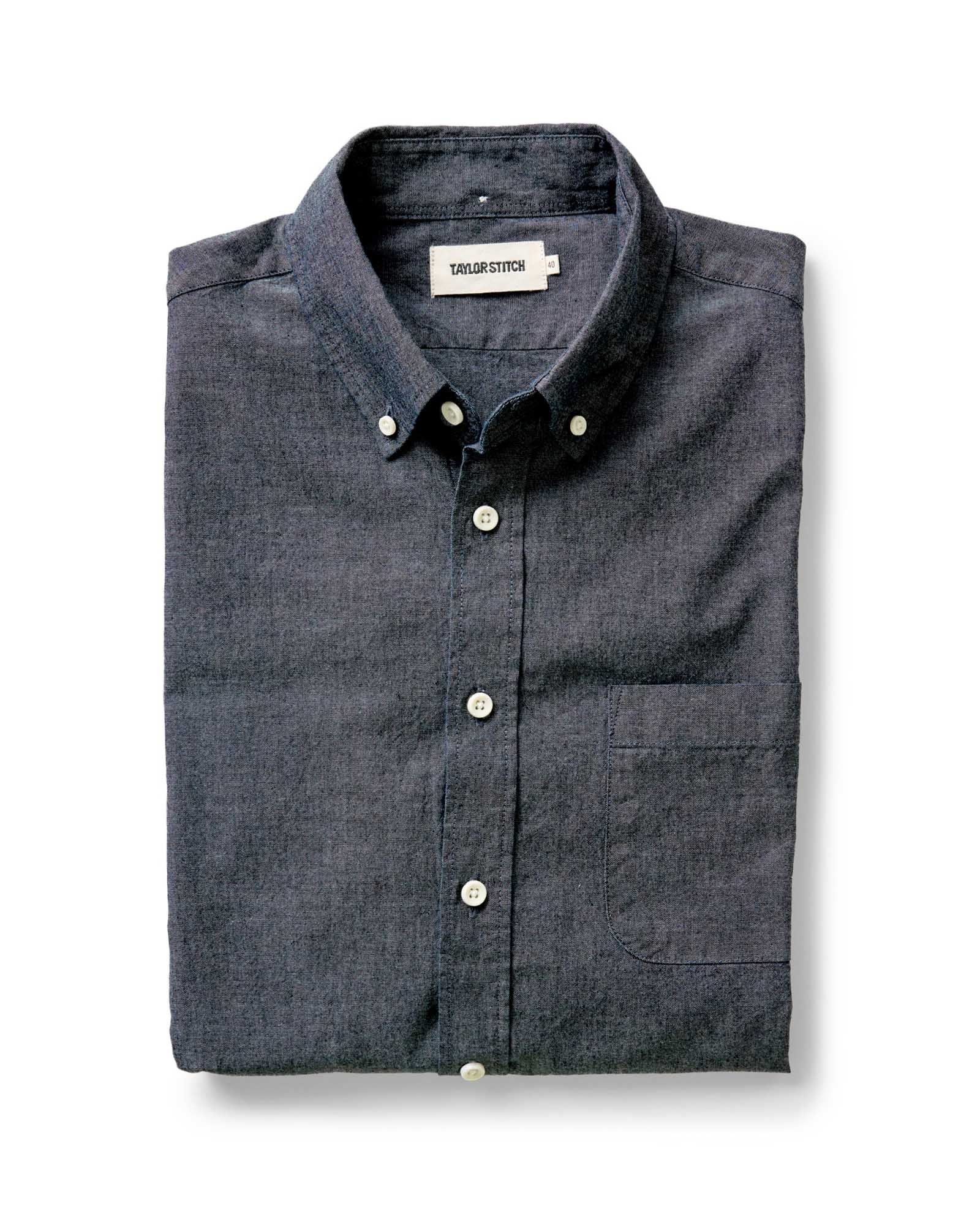 folded flatlay of The Jack in Rinsed Indigo Chambray, Wovens by Taylor Stitch