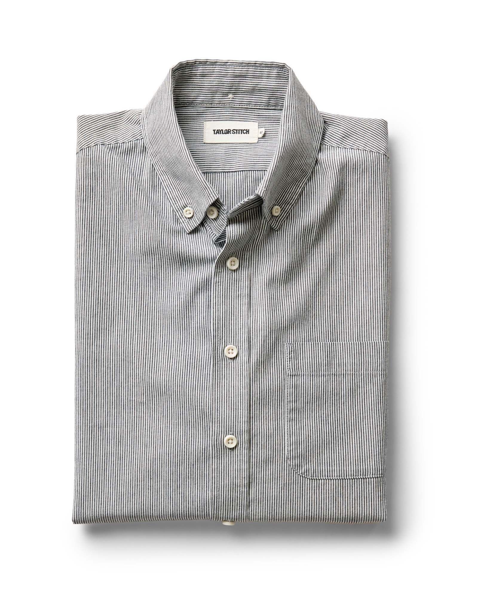 folded flatlay of The Jack in Rinsed Indigo Stripe Chambray, Wovens by Taylor Stitch