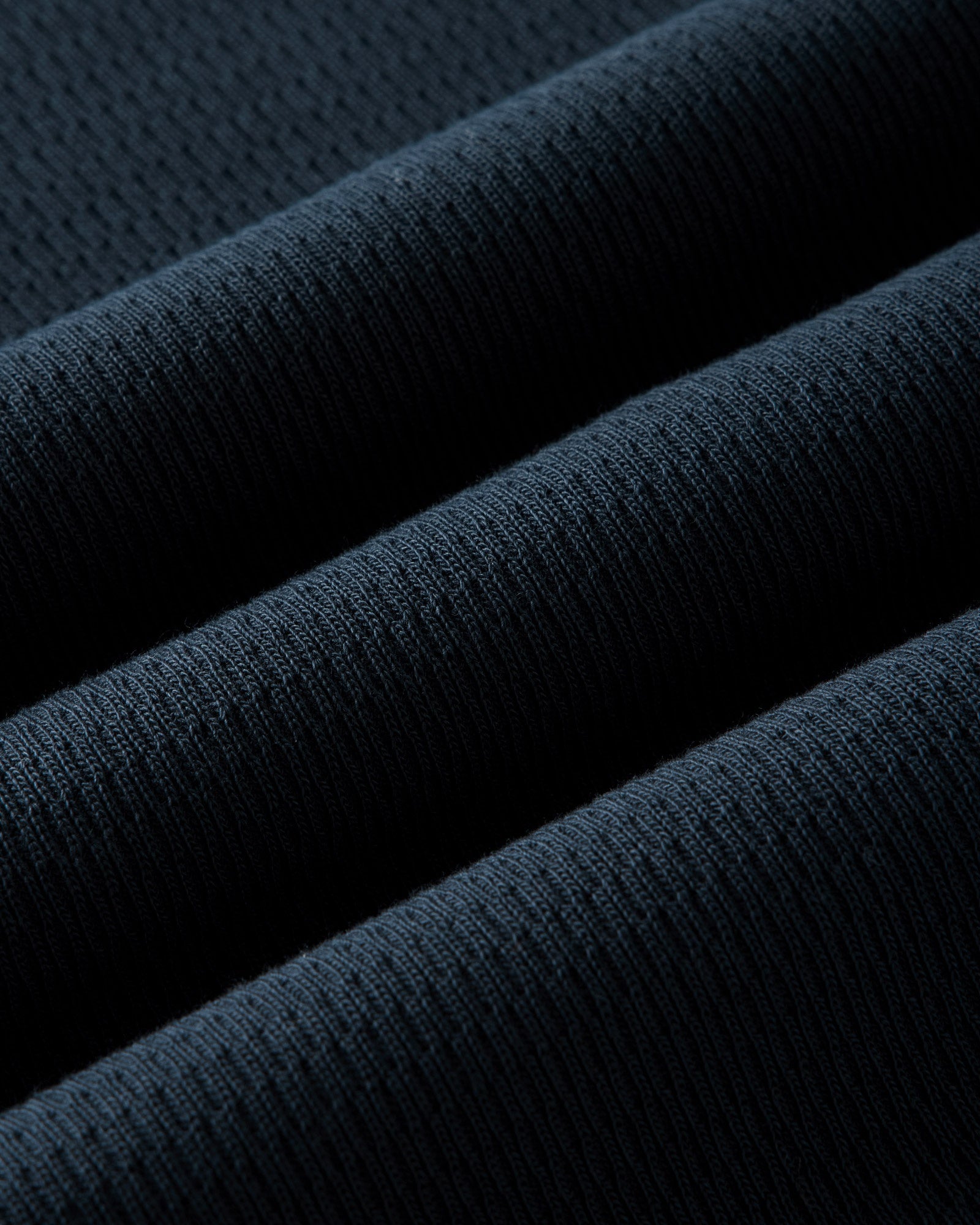 Seed-stitch waffle texture detail of The Organic Cotton Crew in Dark Navy Waffle, Knits by Taylor Stitch