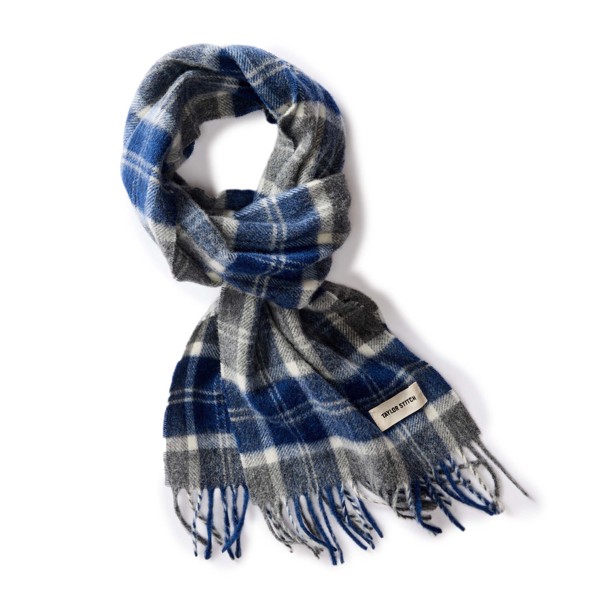 flatlay of The Fireside Scarf in Blue Check Merino, Accessories by Taylor Stitch