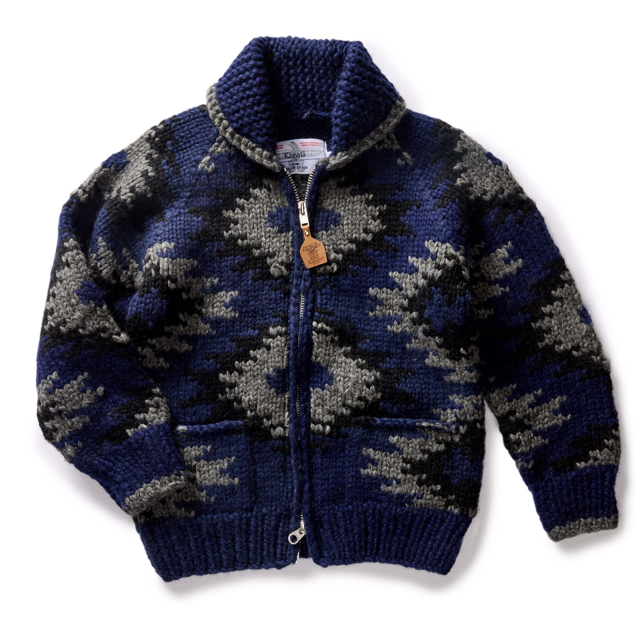 flatlay of The Seawall Hand-Knit Sweater in Navy Kilim, Knits by Taylor Stitch