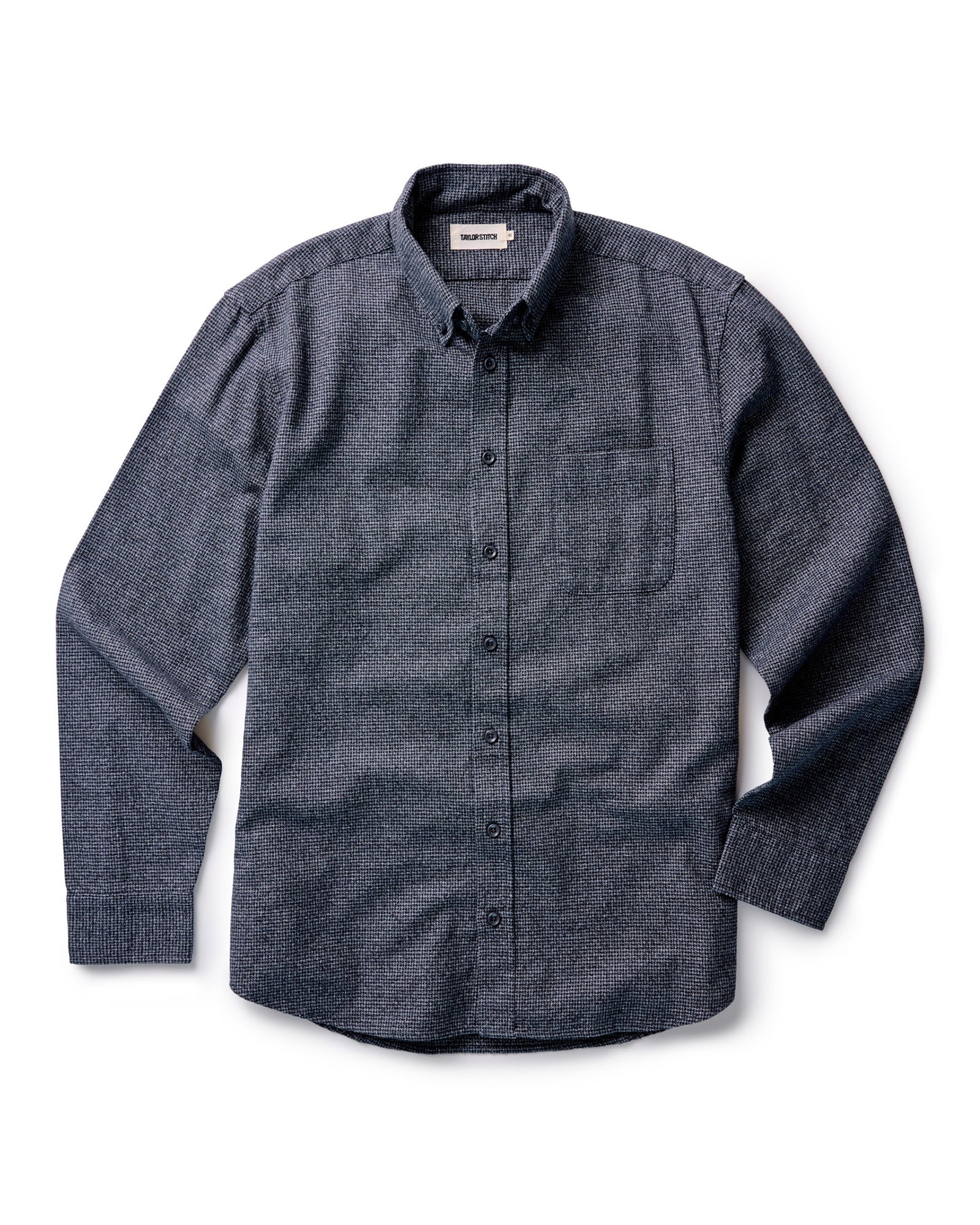 material shot of the charcoal buttons on The Jack in Dark Navy Houndstooth, Wovens by Taylor Stitch