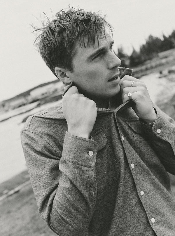 fit model holding the cuff on The Shore Shirt in Driftwood Portuguese Flannel