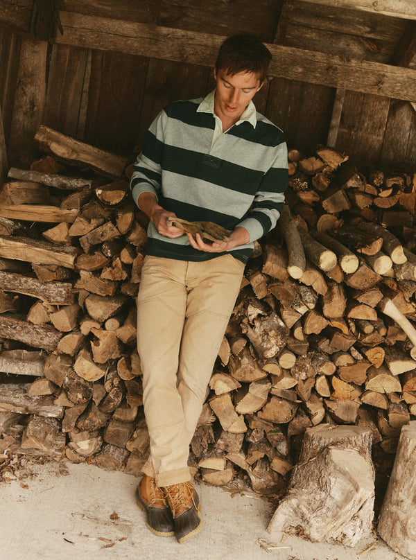 fit model showing off the Rugby Shirt in Dark Forest Stripe