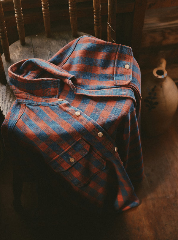 editorial flatlay of The Division Shirt in Sunset Check