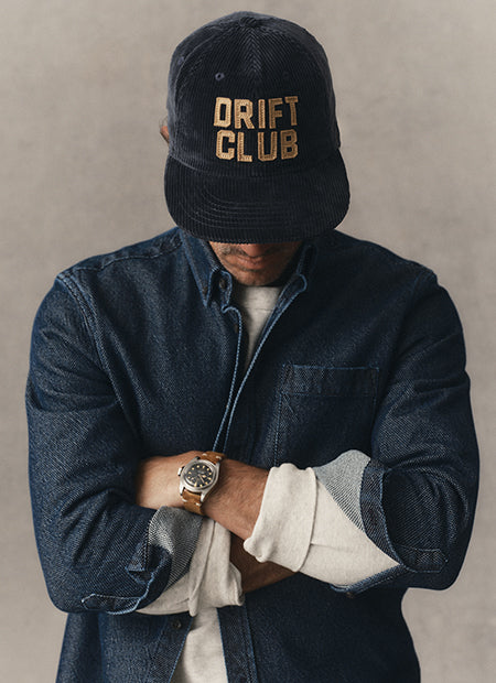 fit model posing in The Mercer Cap in Drift Club, by Taylor Stitch