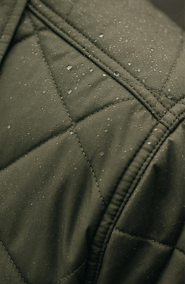 Model showing off dry wax on The Miller Shirt Jacket in Smoked Olive