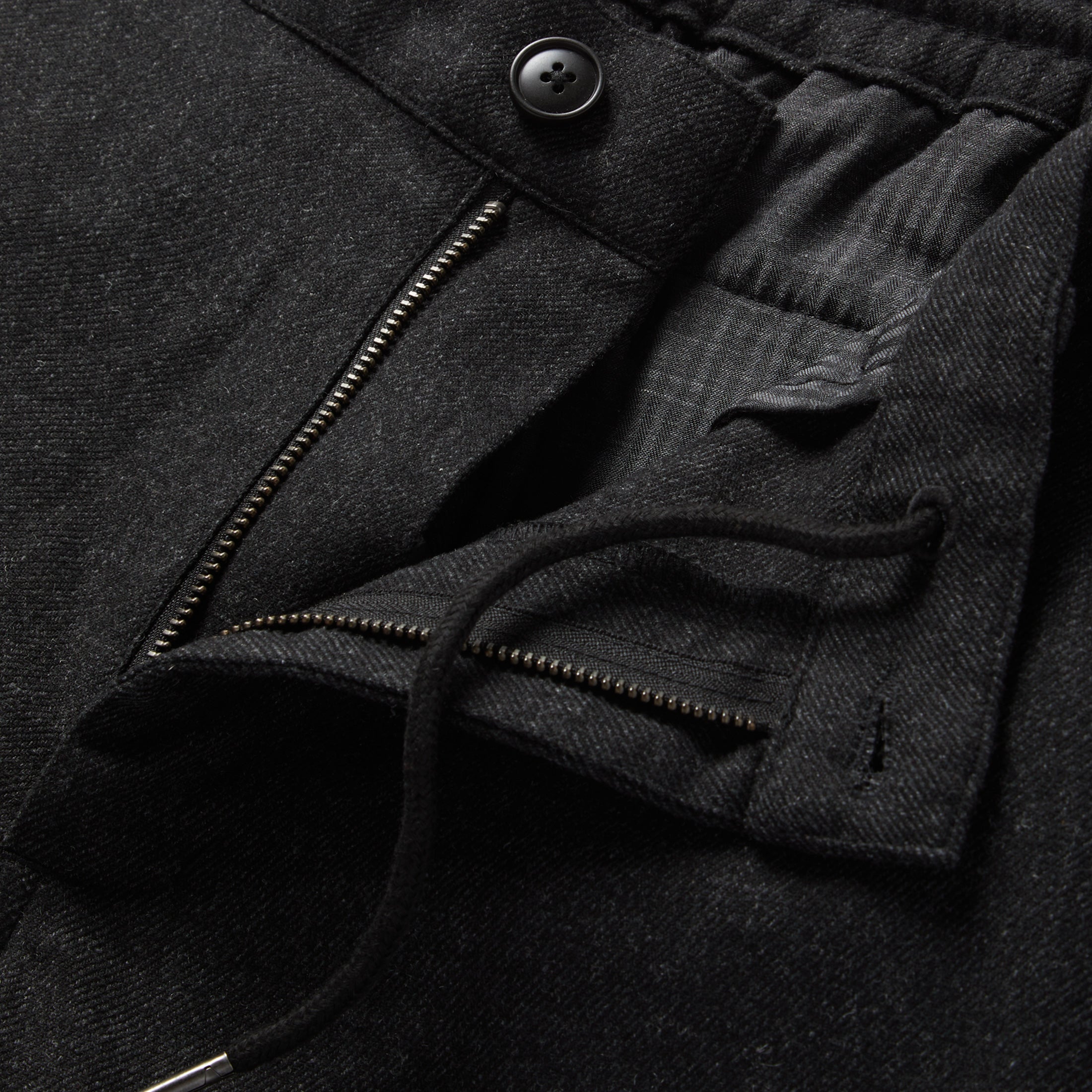 material shot of the zipper fly on The Carmel Pant in Dark Charcoal, Bottoms by Taylor Stitch