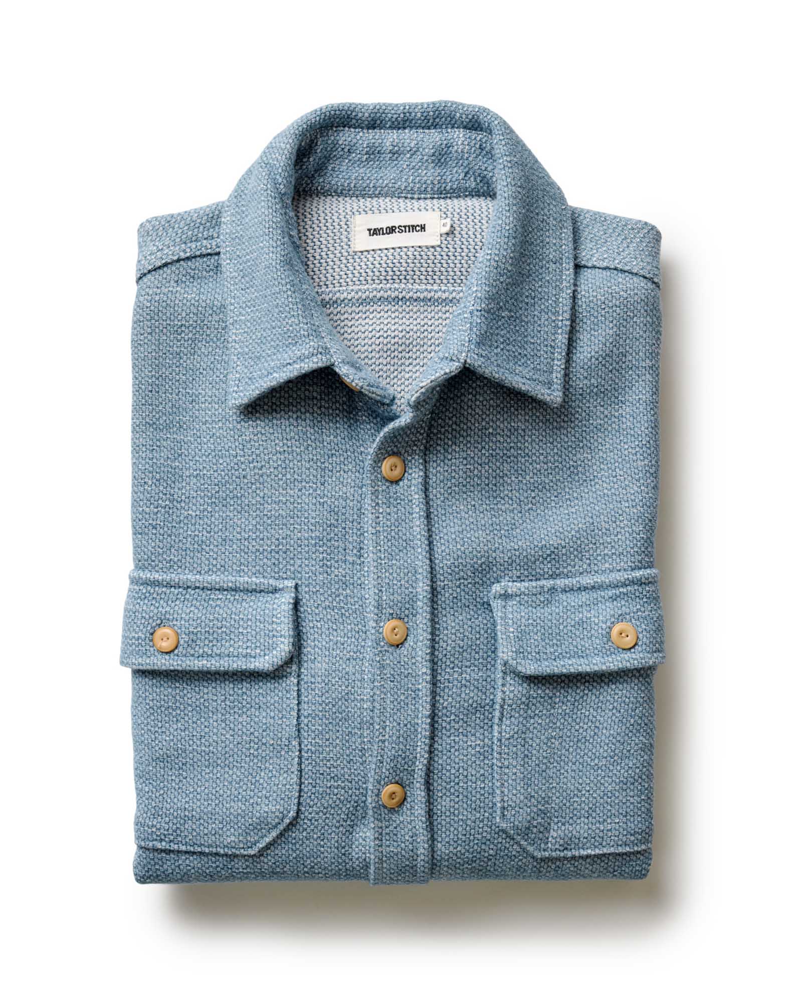 flatlay of The Division Shirt in Washed Indigo folded, Wovens by Taylor Stitch