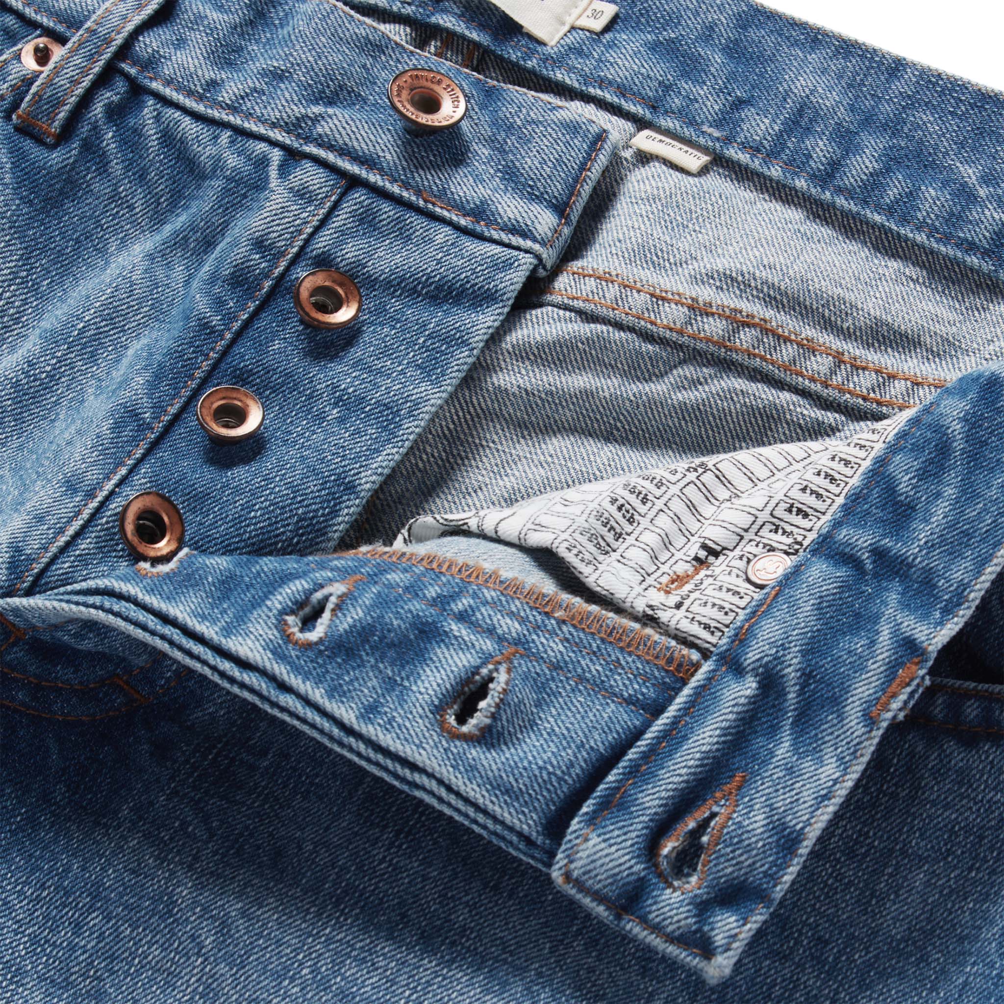 material shot of the button fly on The Democratic Jean in Fletcher Wash Organic Selvage, Bottoms by Taylor Stitch