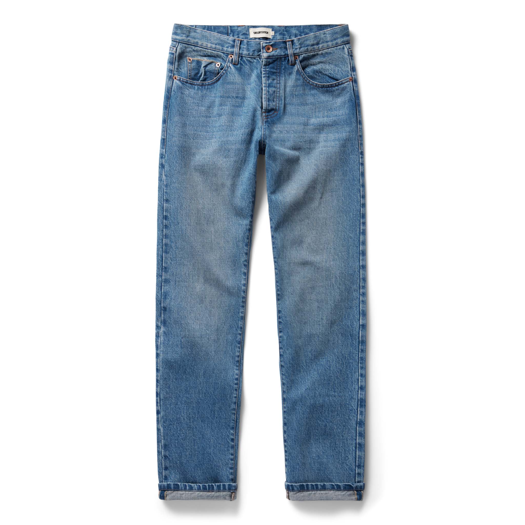 flatlay of The Democratic Jean in Fletcher Wash Organic Selvage, Bottoms by Taylor Stitch