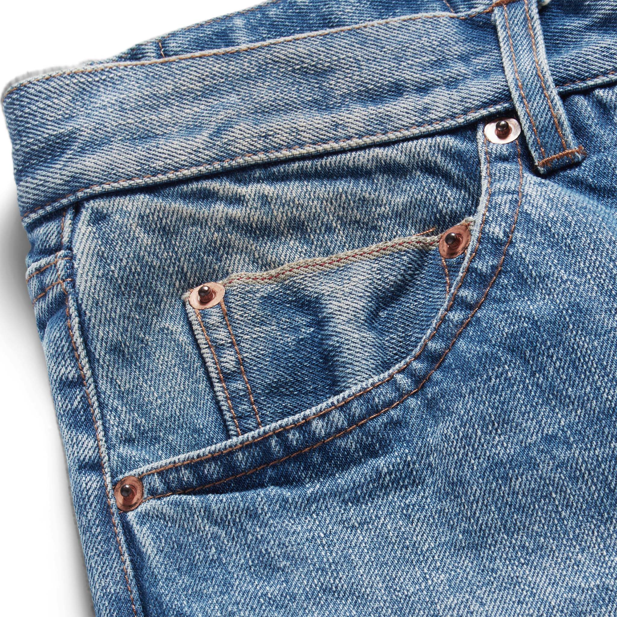 material shot of the selvage pocket on The Slim Jean in Fletcher Wash Organic Selvage, Bottoms by Taylor Stitch