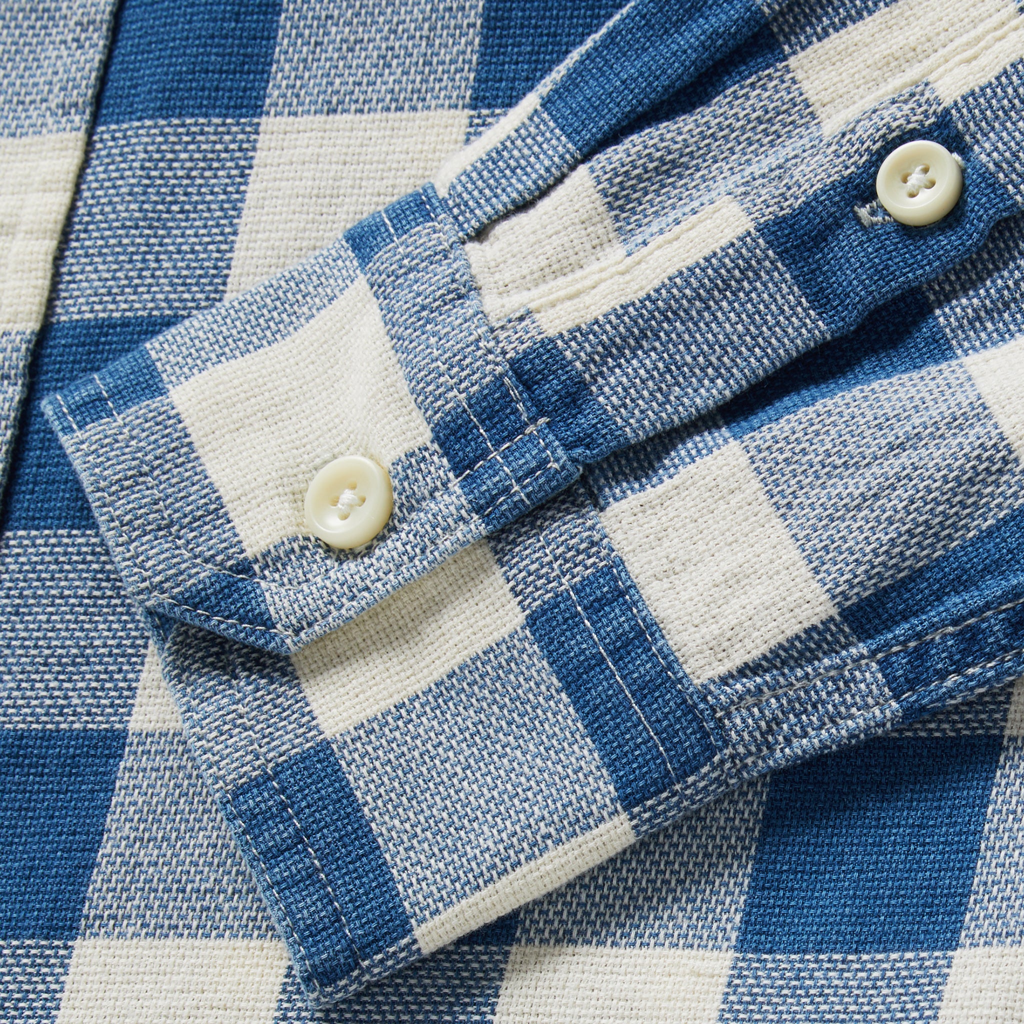 material shot of the cuffs on The Utility Shirt in Sun Bleached Indigo Check, Wovens by Taylor Stitch