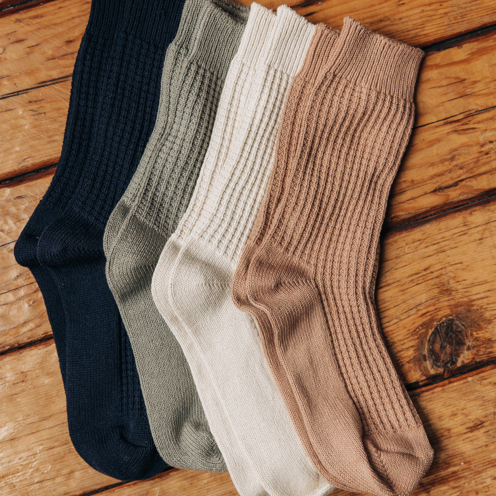 editorial image of various socks for The Waffle Sock in Natural, Accessories by Taylor Stitch
