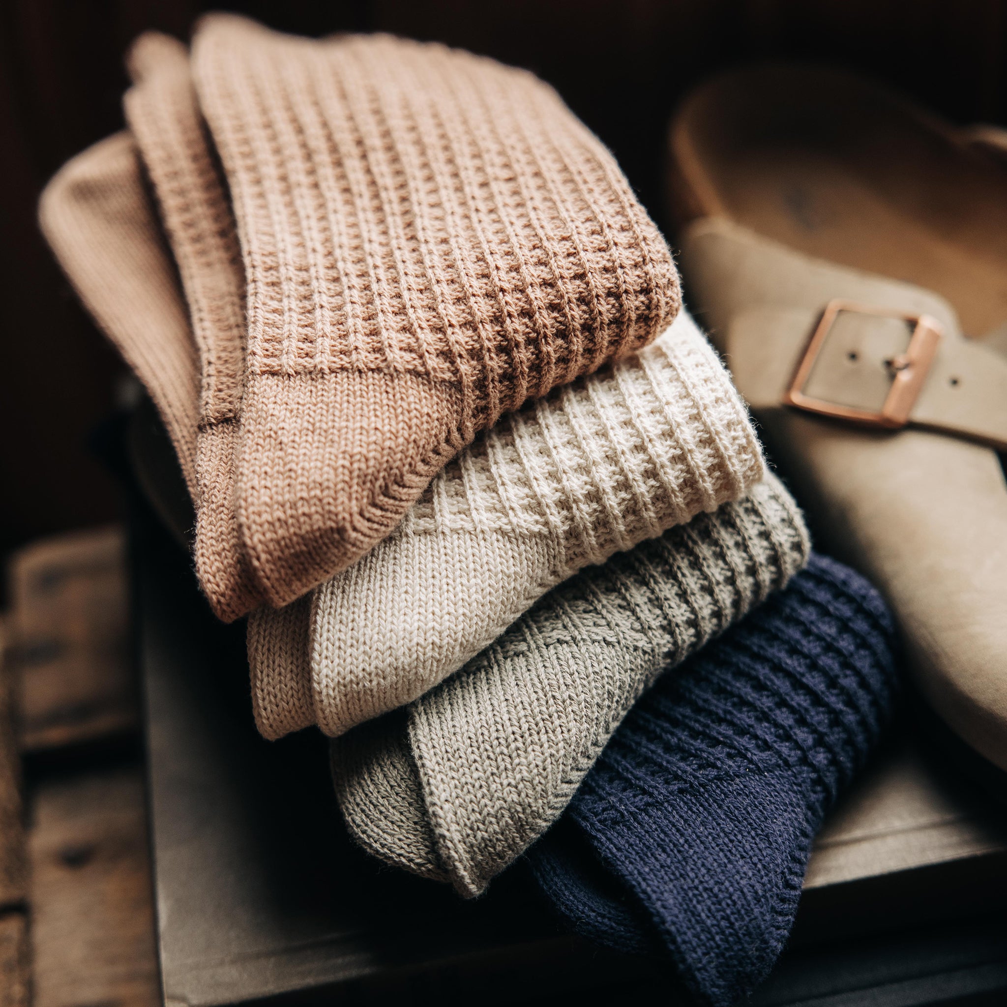 editorial image of socks folded for The Waffle Sock in Sagebrush, Accessories by Taylor Stitch