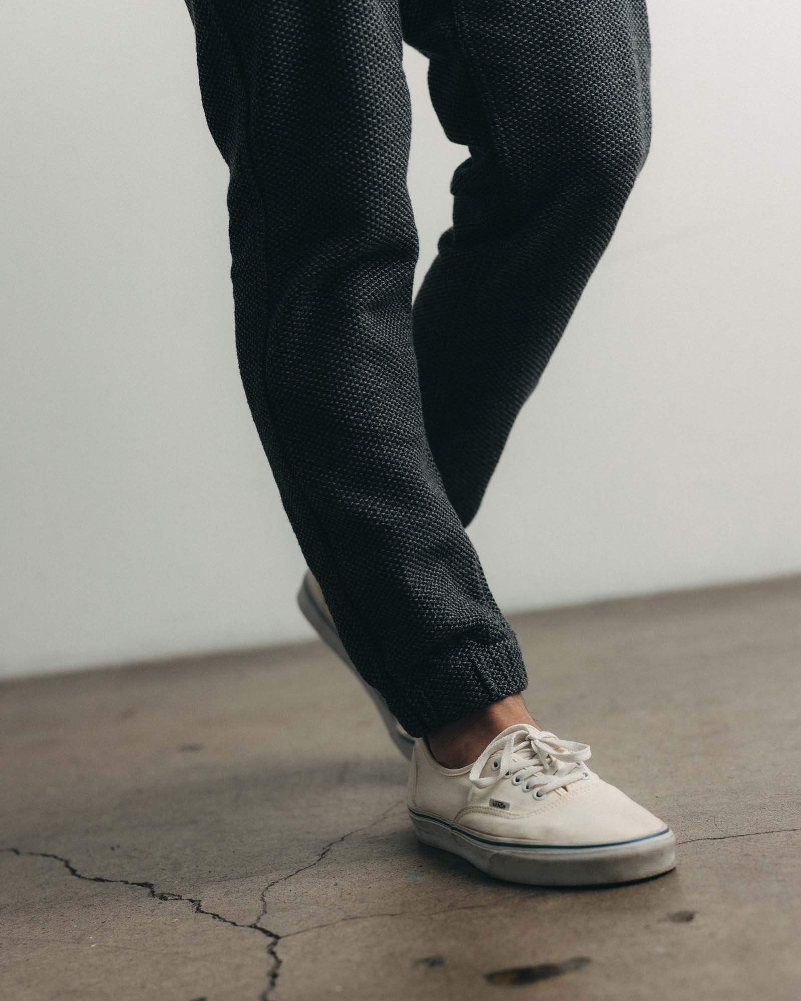 fit model wearing The Apres Pant in Charcoal Sashiko, up close shot, Bottoms by Taylor Stitch