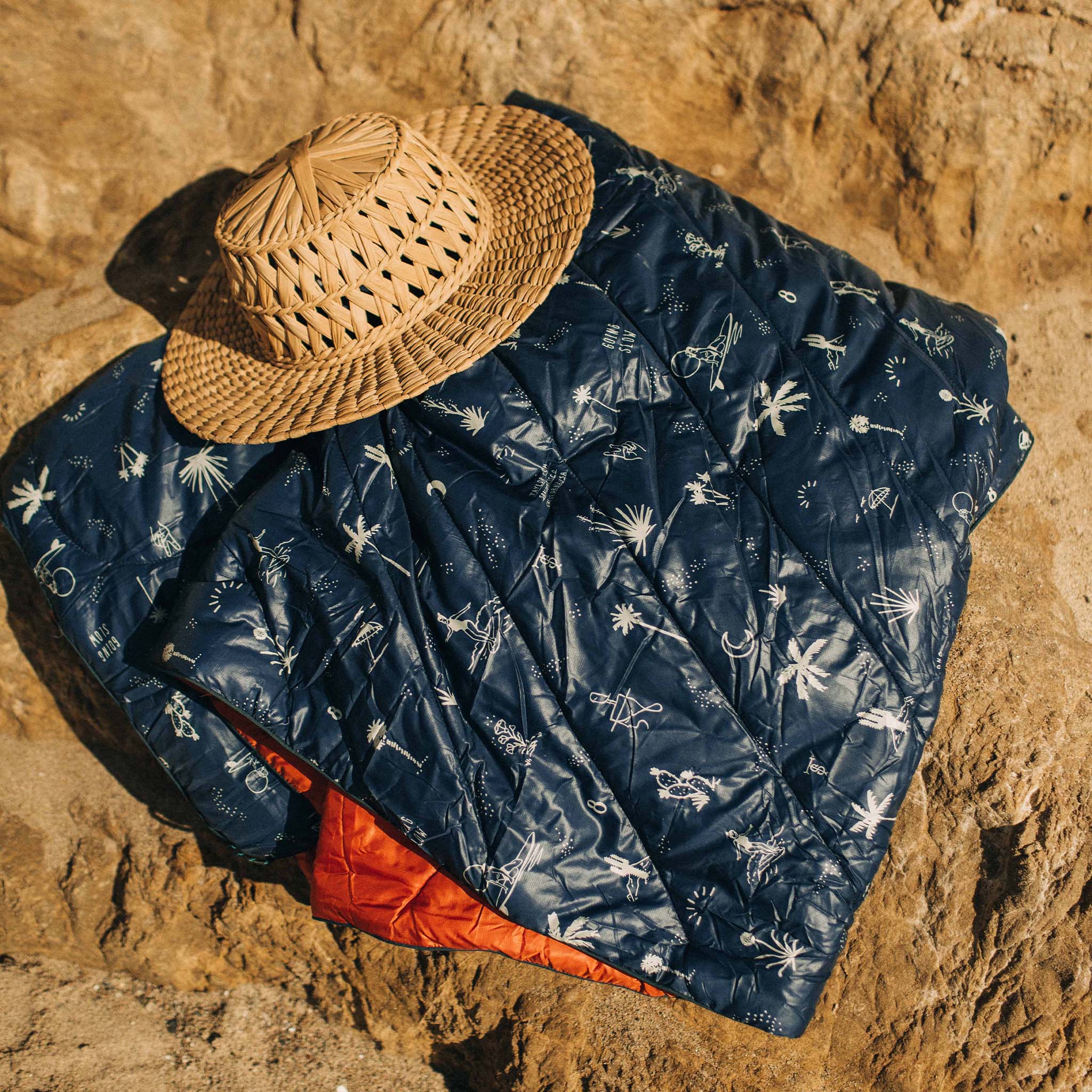 The Original Puffy Blanket in Navy Aloha in the sun, Accessories by Taylor Stitch